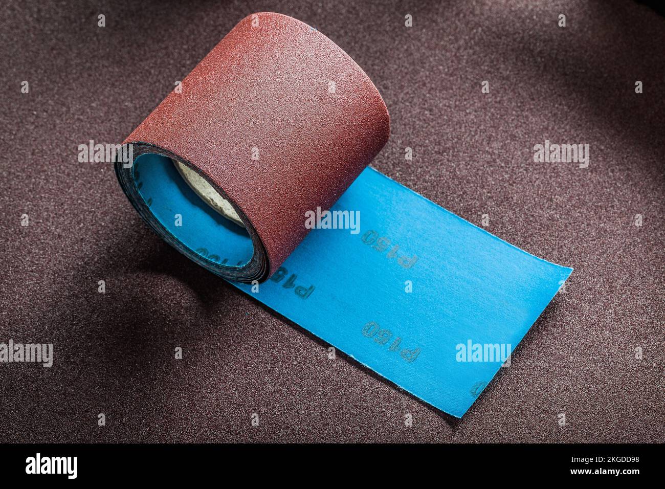 big roll of abrasive paper on sandpaper sheet Stock Photo Alamy
