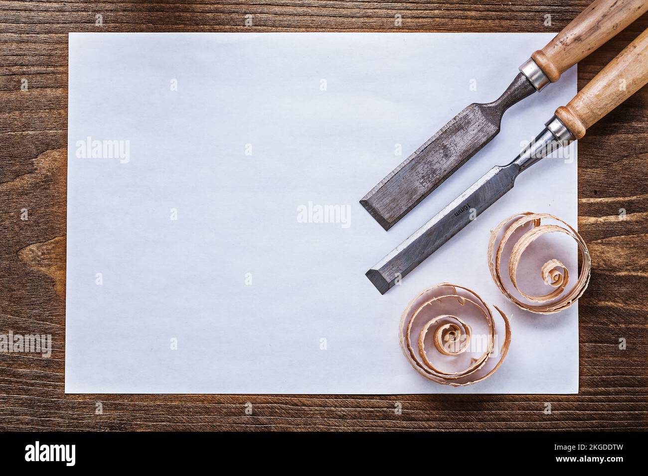 Blank sheet of paper wood scobs firmer chisels construction concept
