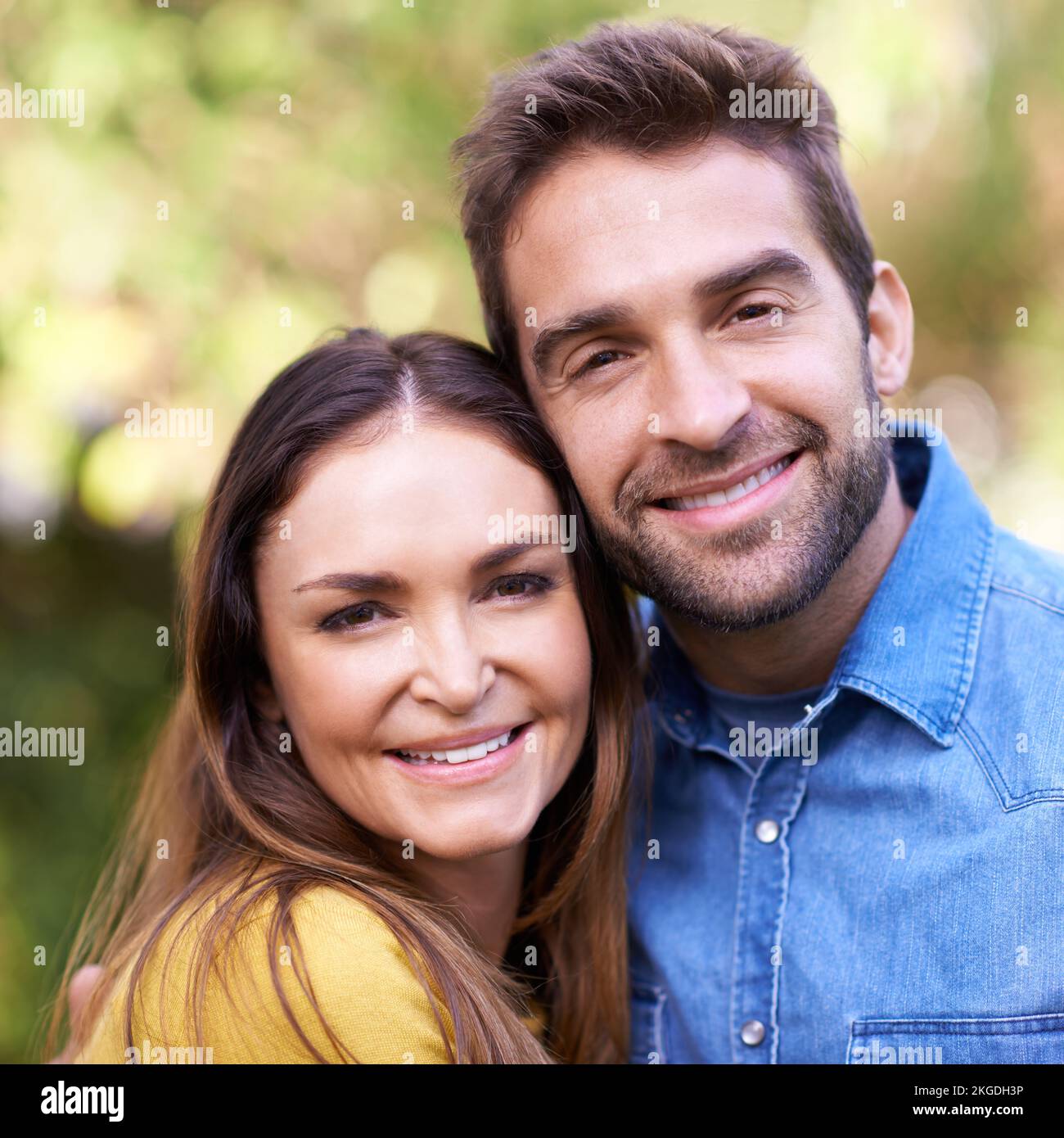 They are the perfect couple. Closeup portrait of a loving young couple in the outdoors. Stock Photo