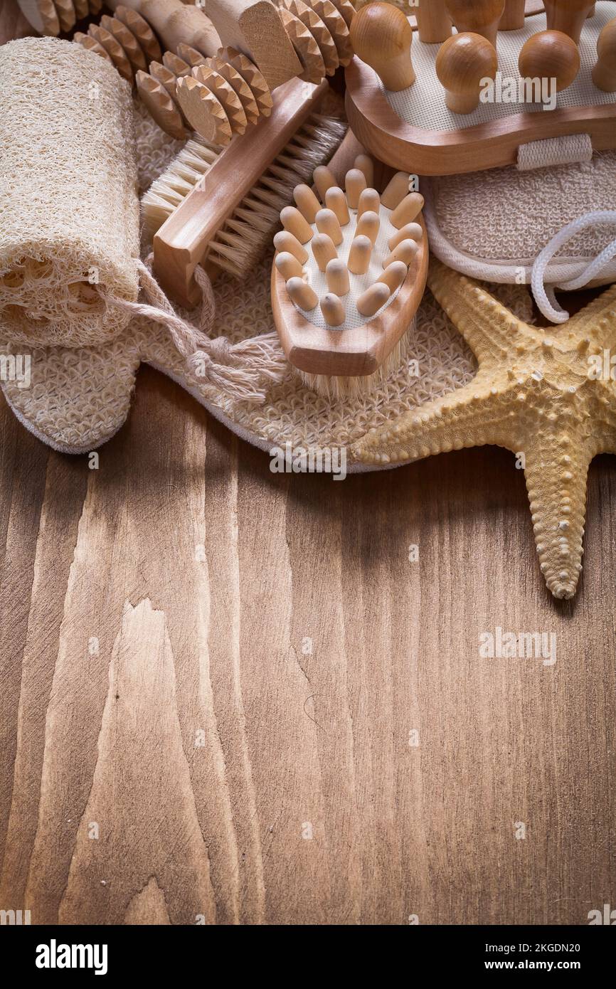 Close-up version of sauna articles on pine vintage wooden board healthcare concept Stock Photo