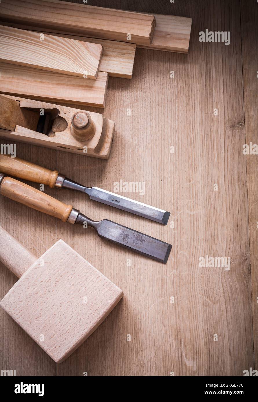 Group of wooden joiner’s working tools on wood board close up view construction concept. Stock Photo