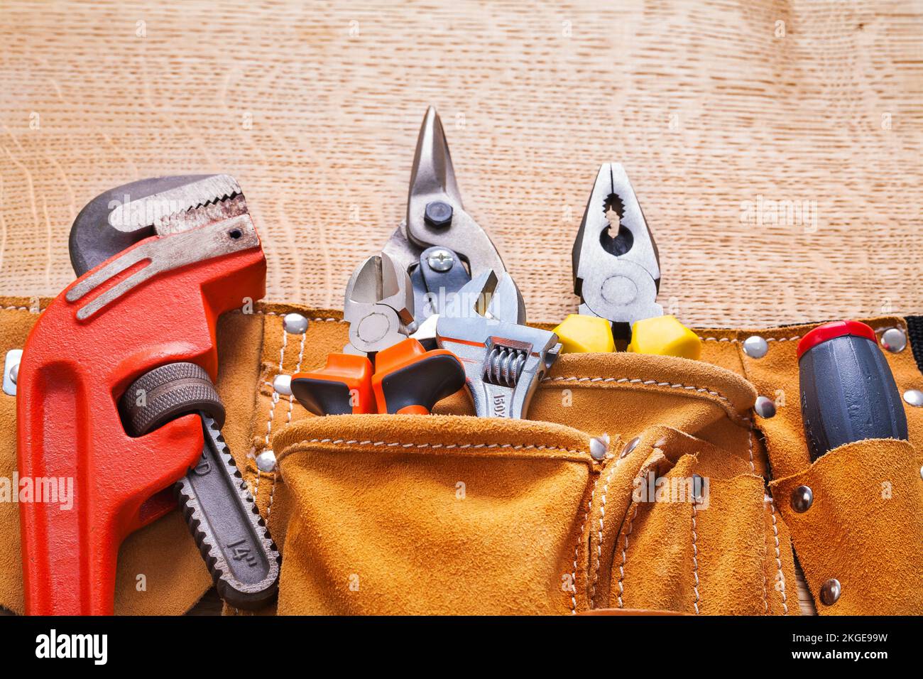 horizontal view construction tools in toolbelt monkey wrench nippers