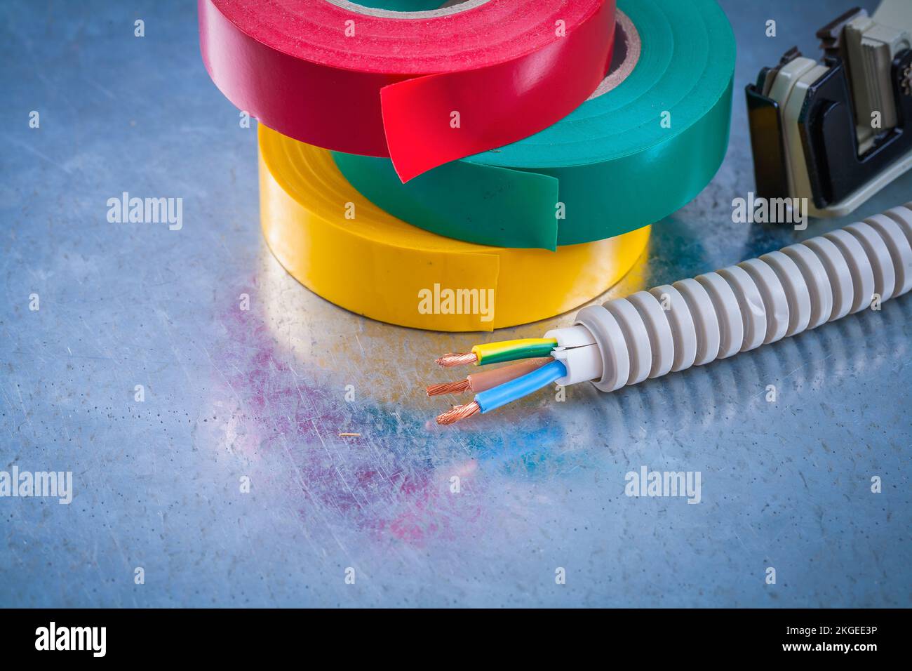 Metal strippers conduct tubing wires and insulating tape Stock Photo