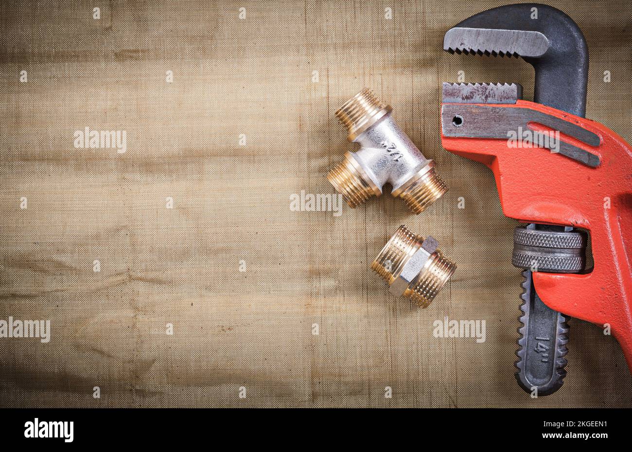 Mohkey wrench plumbing fixtures on mesh filter grid Stock Photo - Alamy