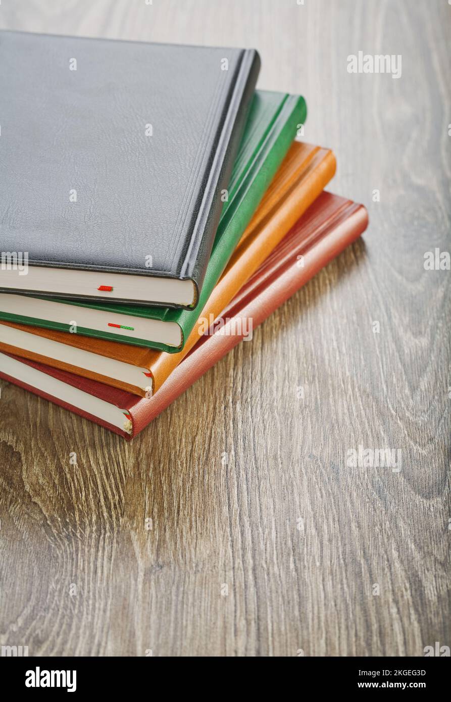 notebooks on wooden board Stock Photo
