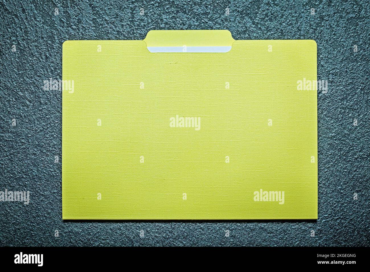 Office folder with paper on black background. Stock Photo