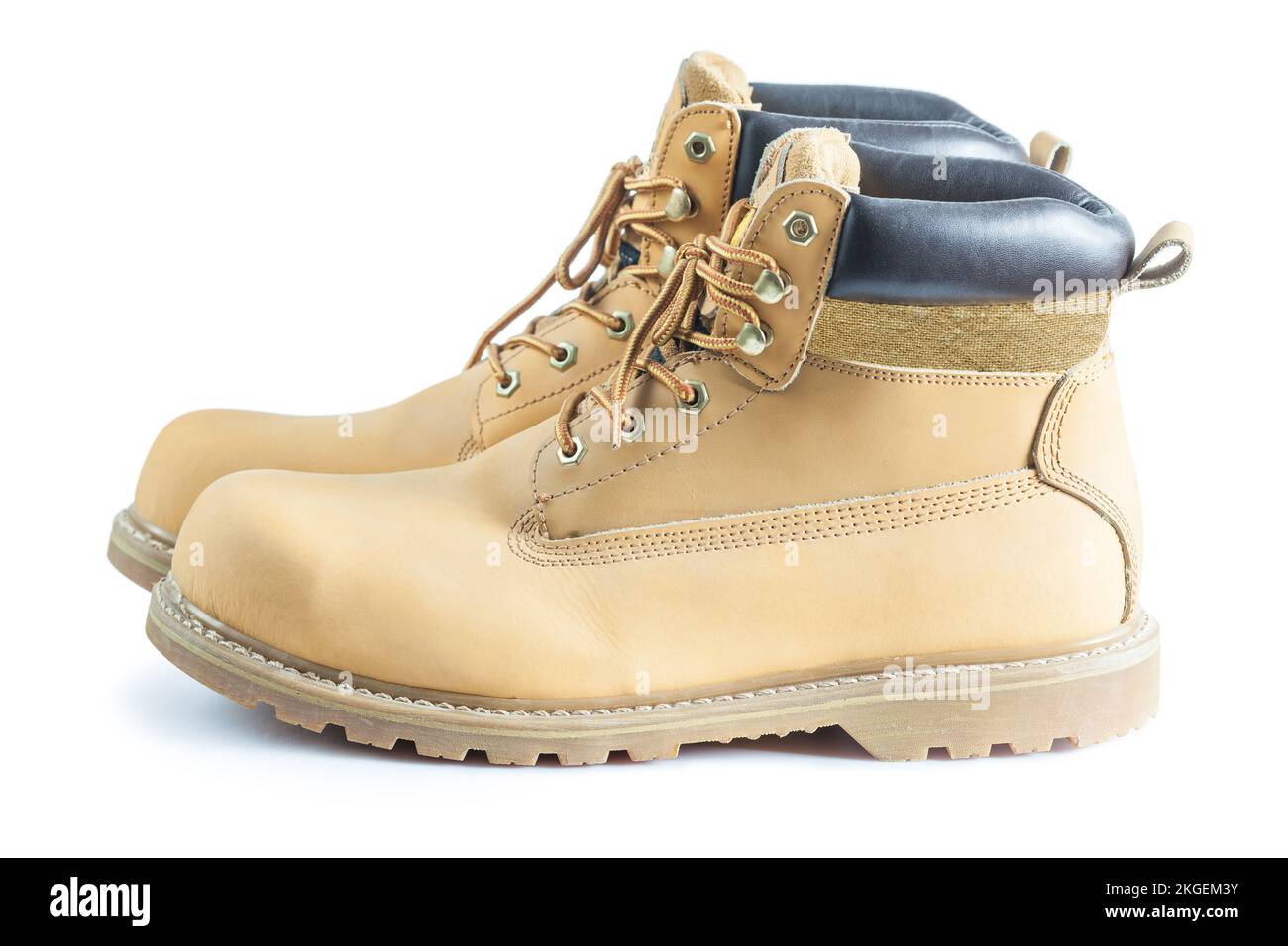 Pair of safety boots isolated on white Stock Photo - Alamy