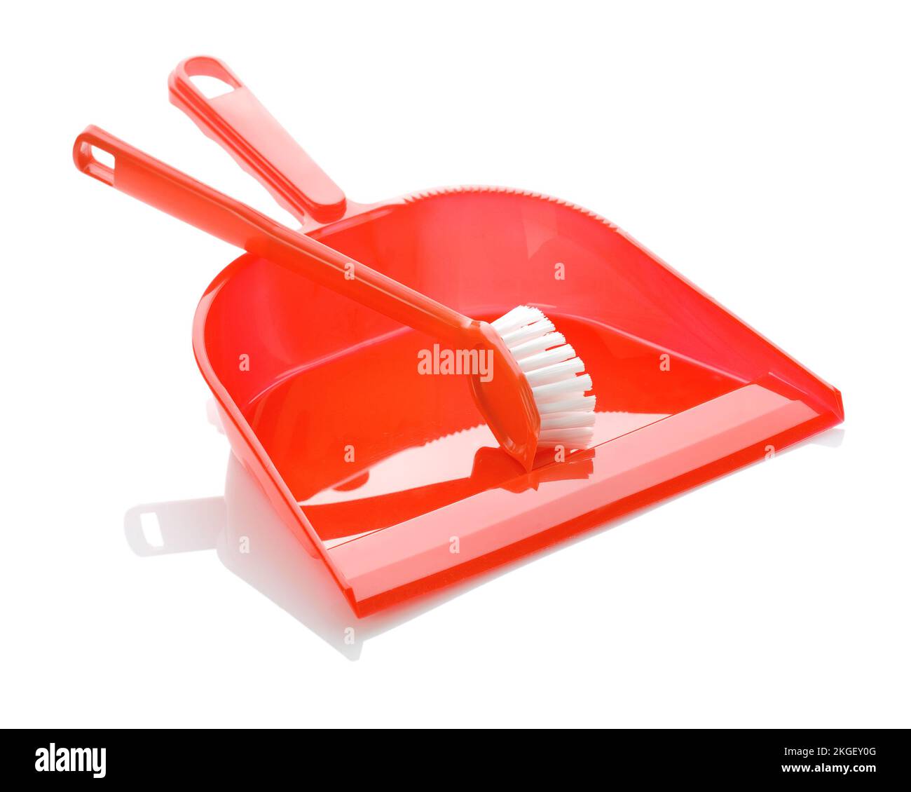 red plastic dustpan with brush Stock Photo Alamy