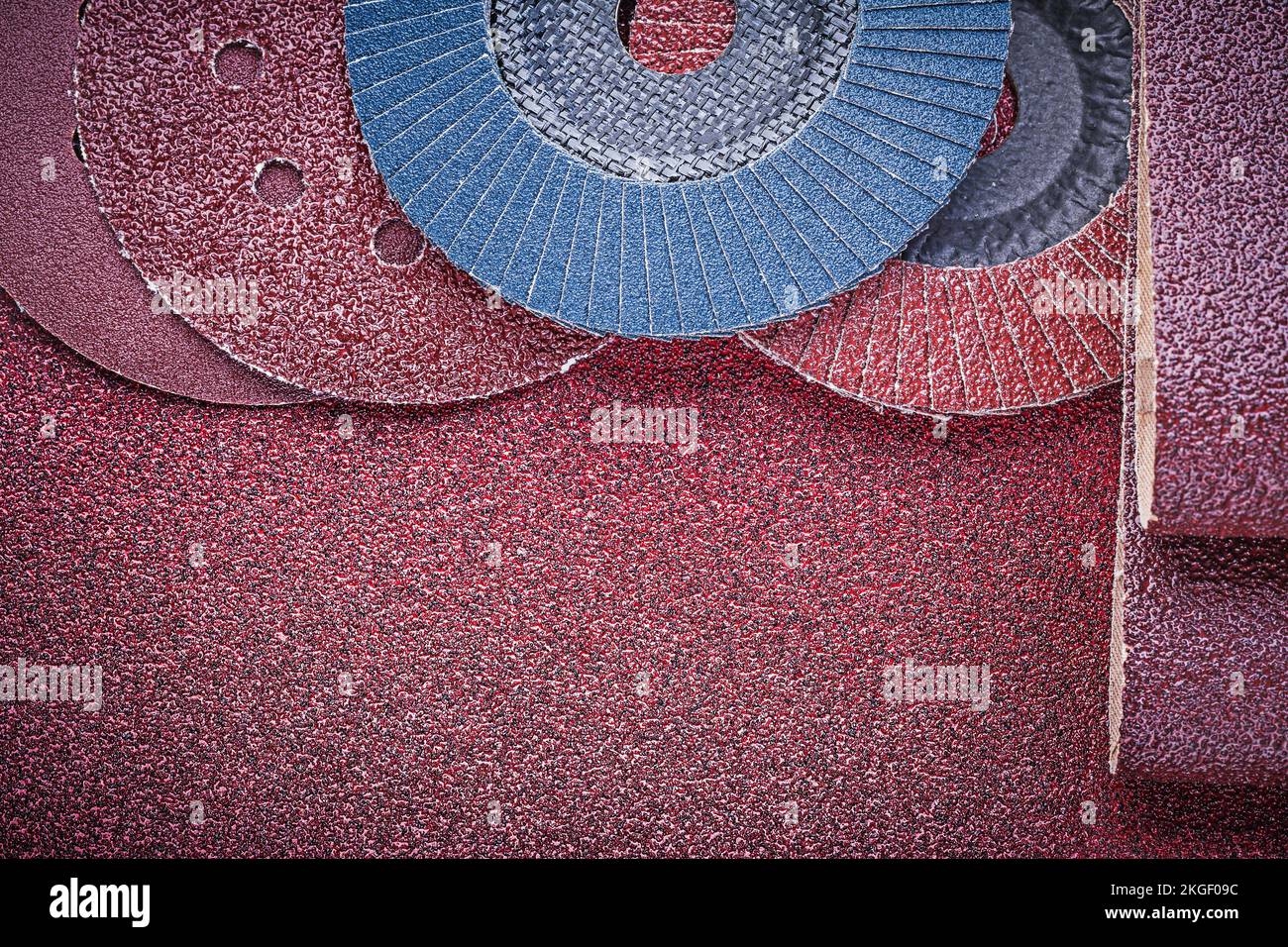 Rolled glasspaper abrasive wheels on polishing sheet Stock Photo Alamy