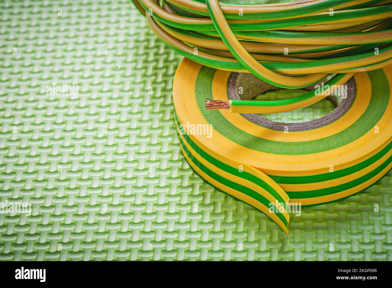 Rolled up insulating tape electrical cable electricity concept Stock