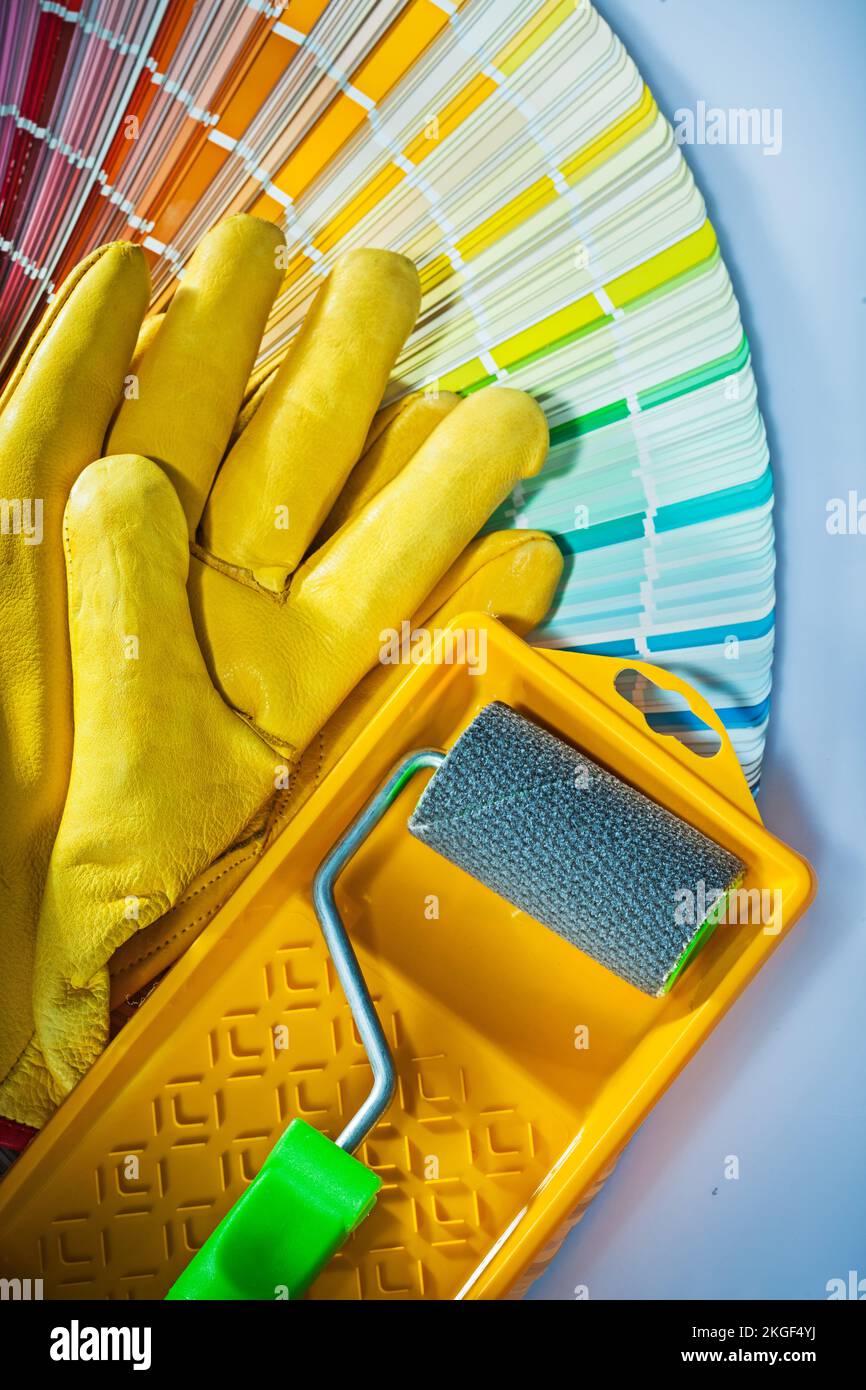 Set of painting equipment on white surface. Stock Photo