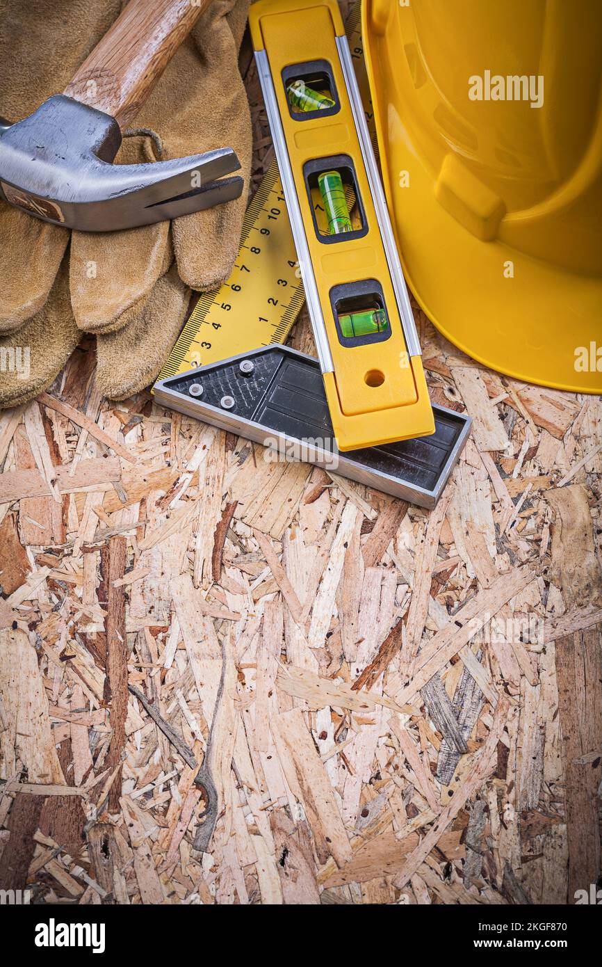 Square Ruler Consruction Square ruler construction level claw hammer hard hat leather gloves ...