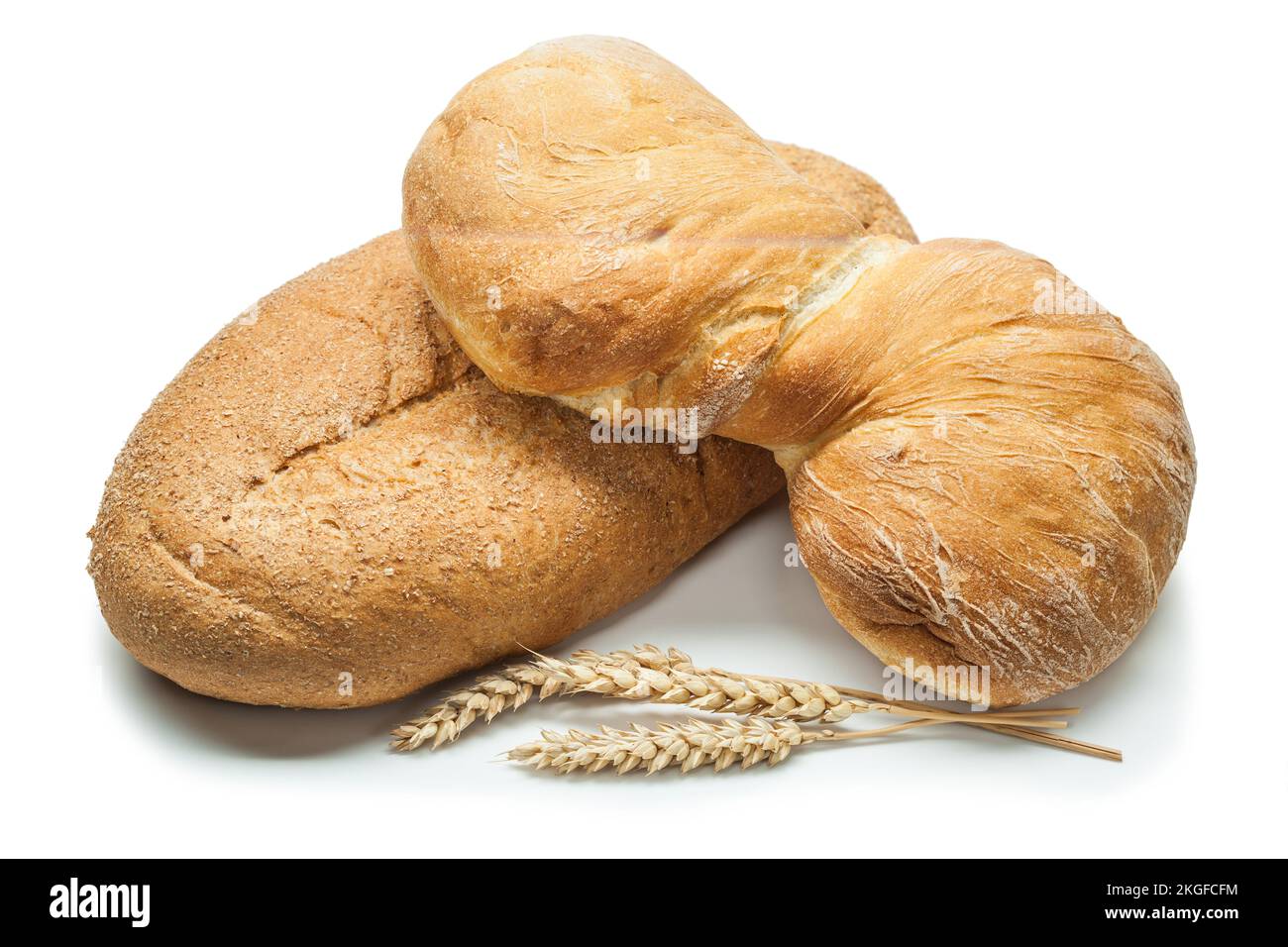 two loafs of bread and wheat ears isolated on white background Stock ...