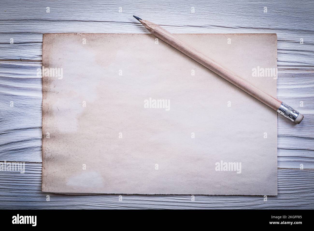 Vintage clean paper sheet pencil on wooden board Stock Photo - Alamy