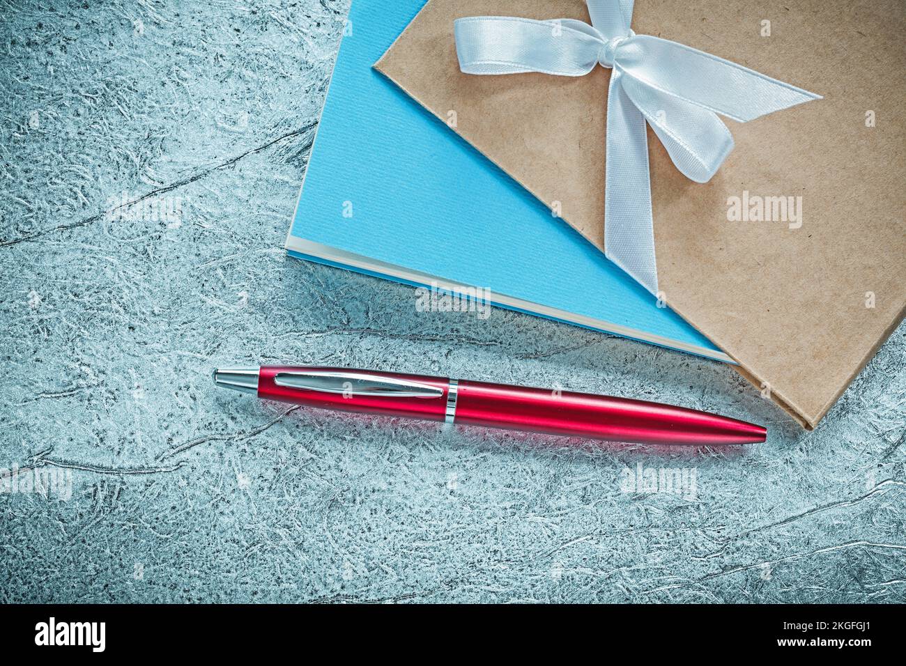 Vintage notepads ballpoint pen on silver background Stock Photo Alamy
