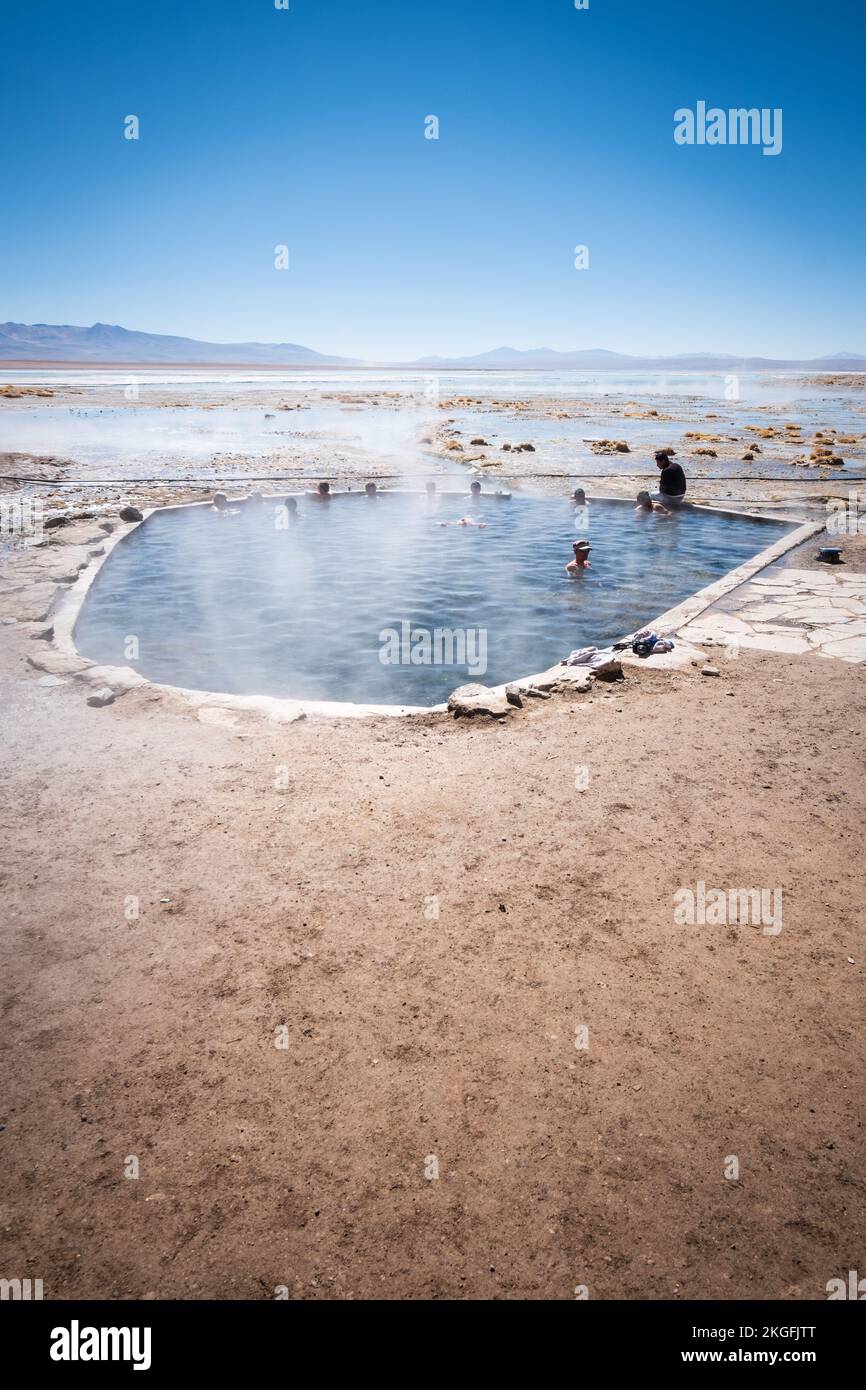 Tourists bathing at Termas de Polques (Polques Hot Springs) in Eduardo