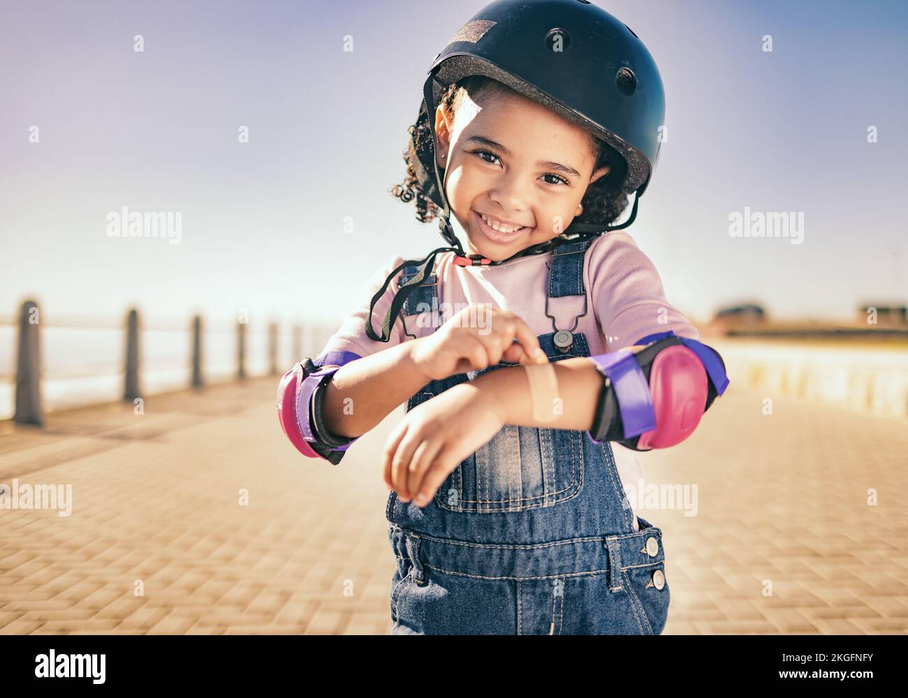 Skating injury, first aid or child portrait with bandage bruise from