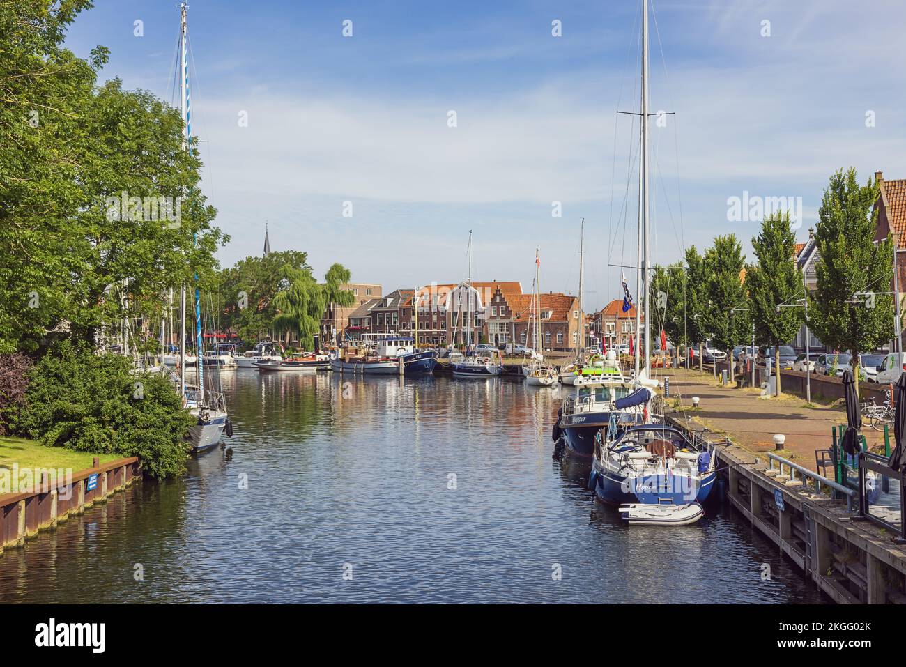 Editorial: ENKHUIZEN, NORTH HOLLAND, NETHERLANDS, JULY 12, 2022 - The old port of Enkhuizen seen from the bascule bridge near the Drommedaris gate Stock Photo