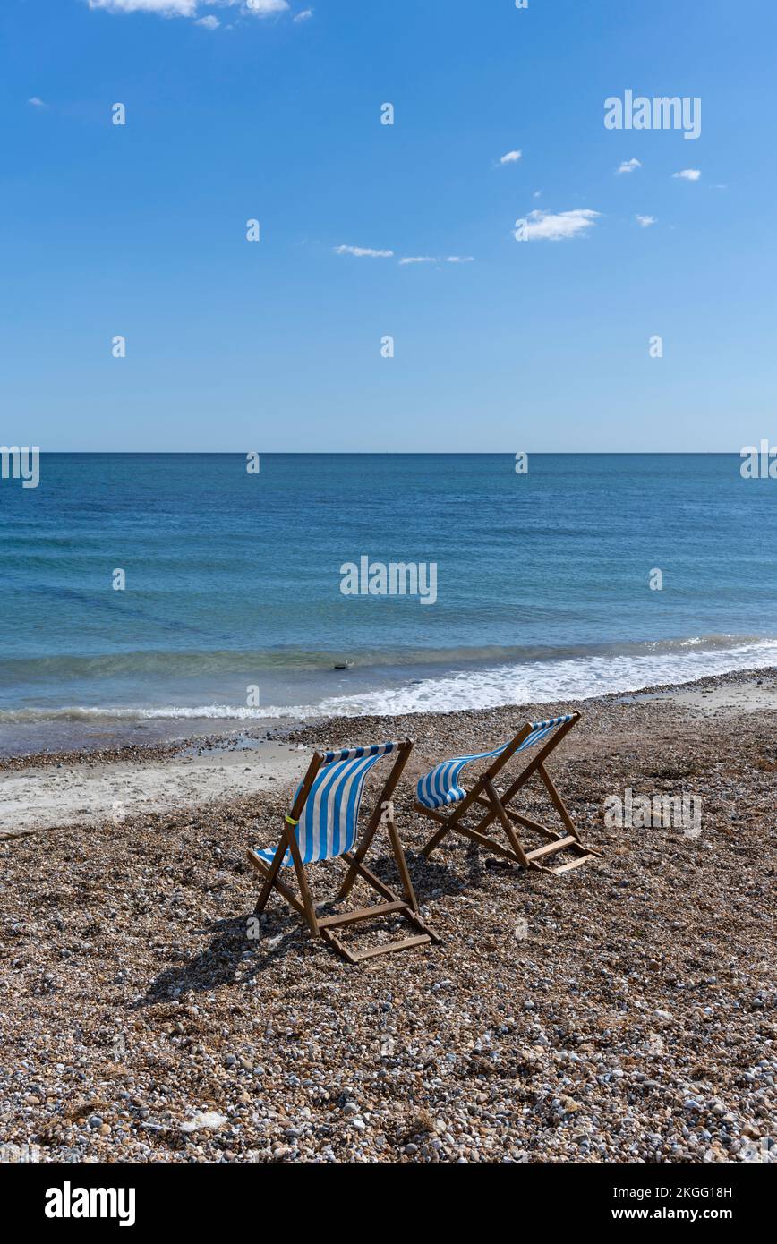 Deck chairs on the beach at Bognor Regis, England. Stock Photo