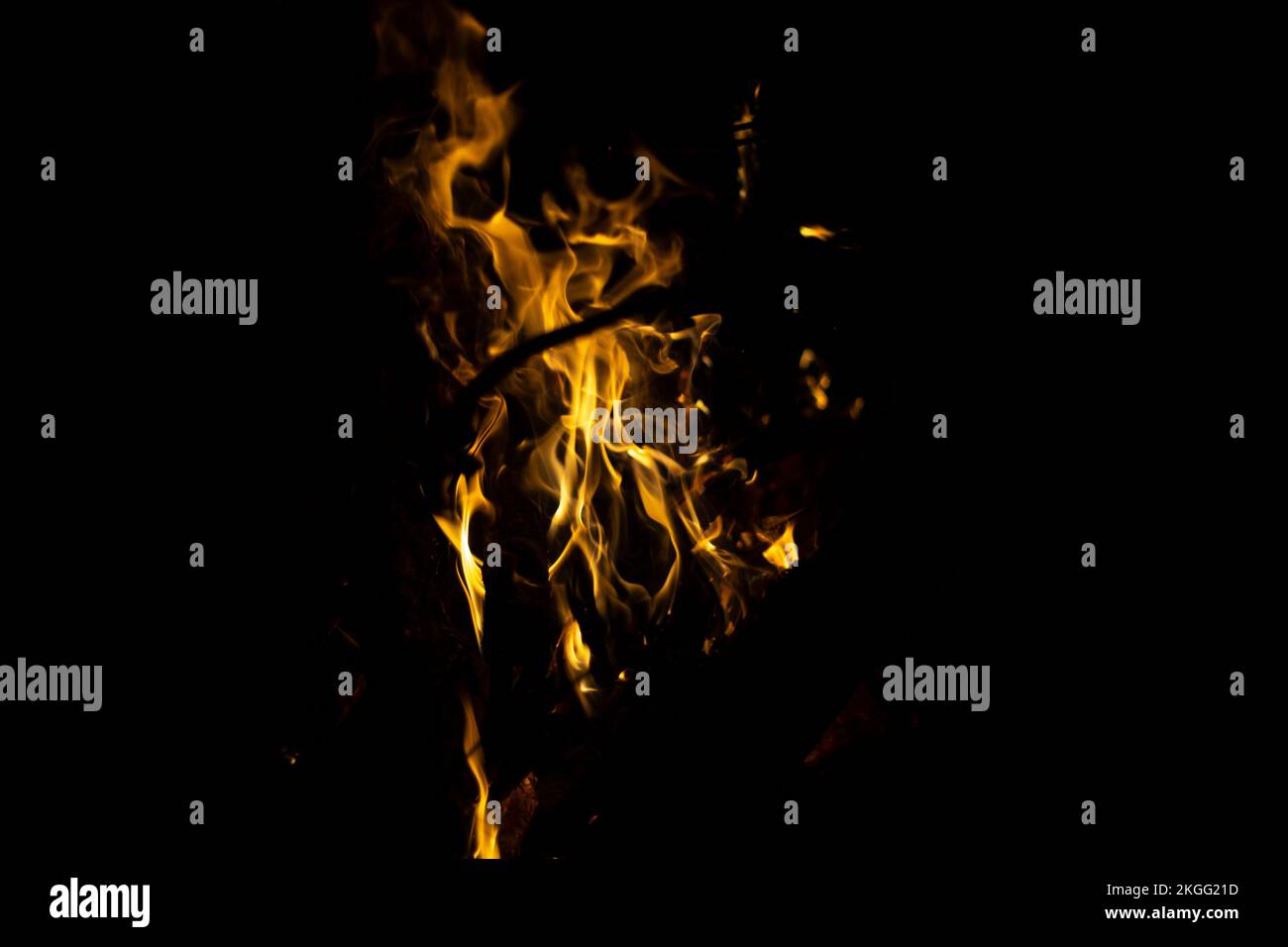 Flames in dark. Details of fire. Fire on black background. Process of