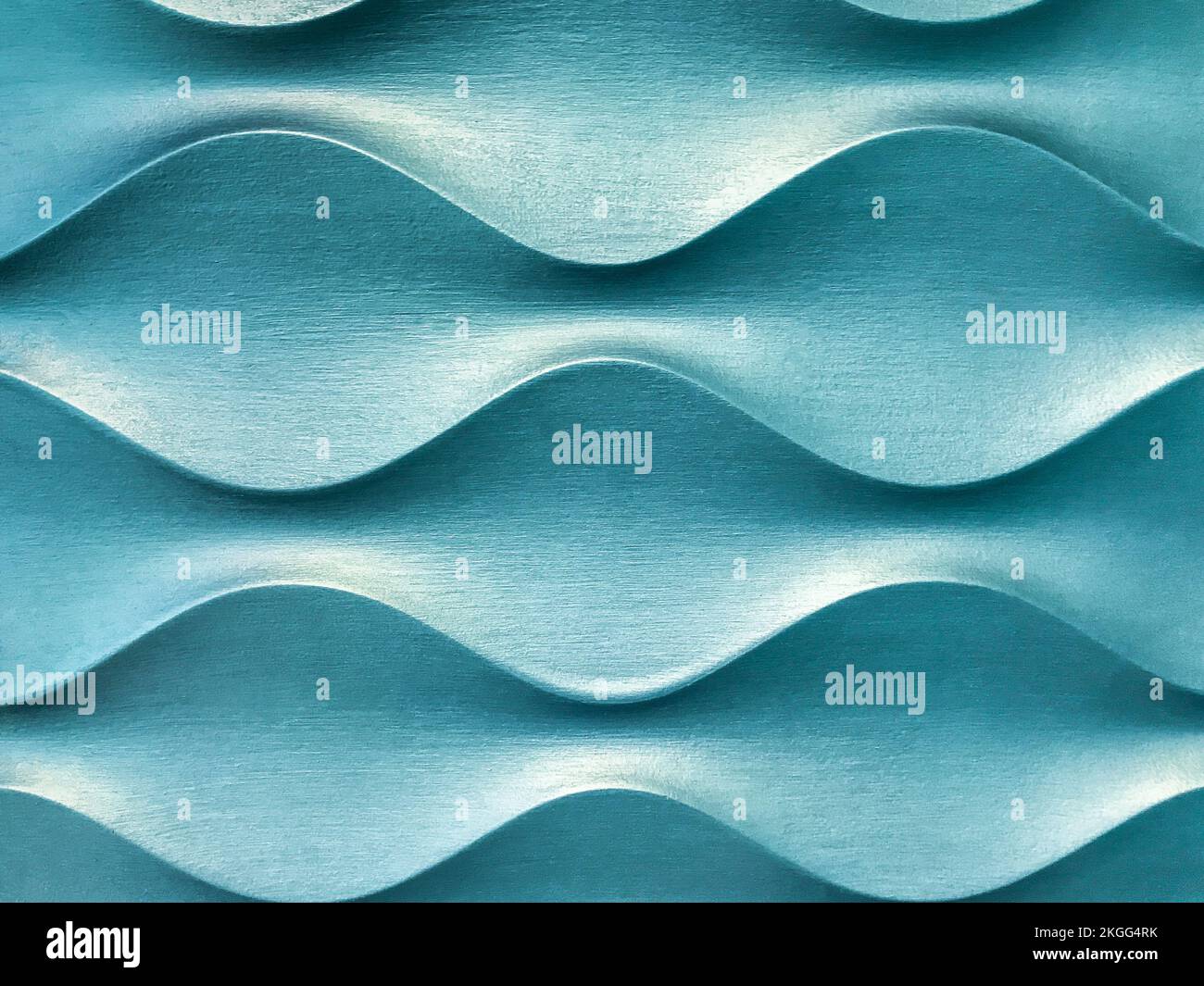 Light blue 3D interior decorative wall panel with unusual geometric shape. Metallic turquoise background with pattern. Abstract texture. Stock Photo