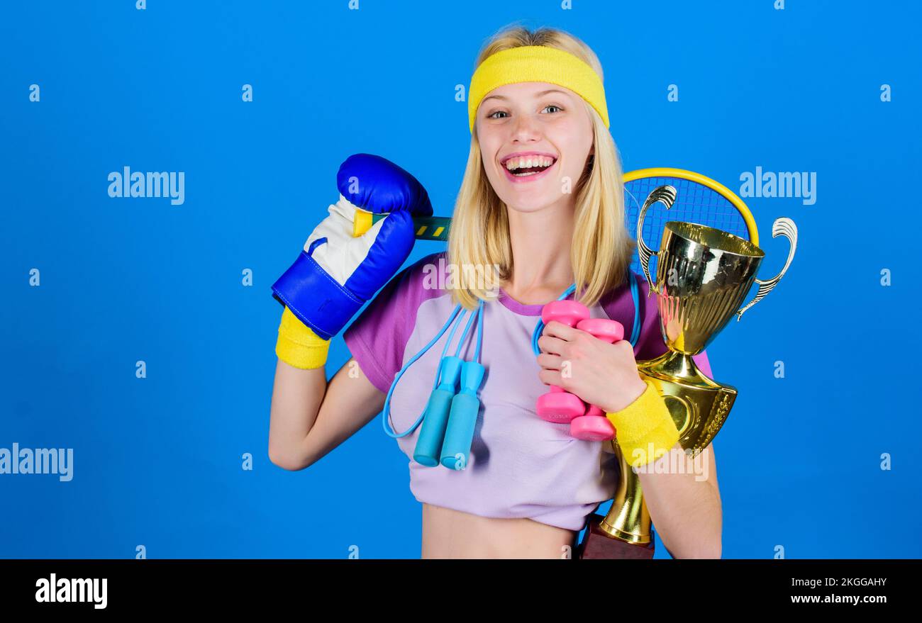Fitness champion. Champion concept. Girl successful modern woman hold ...