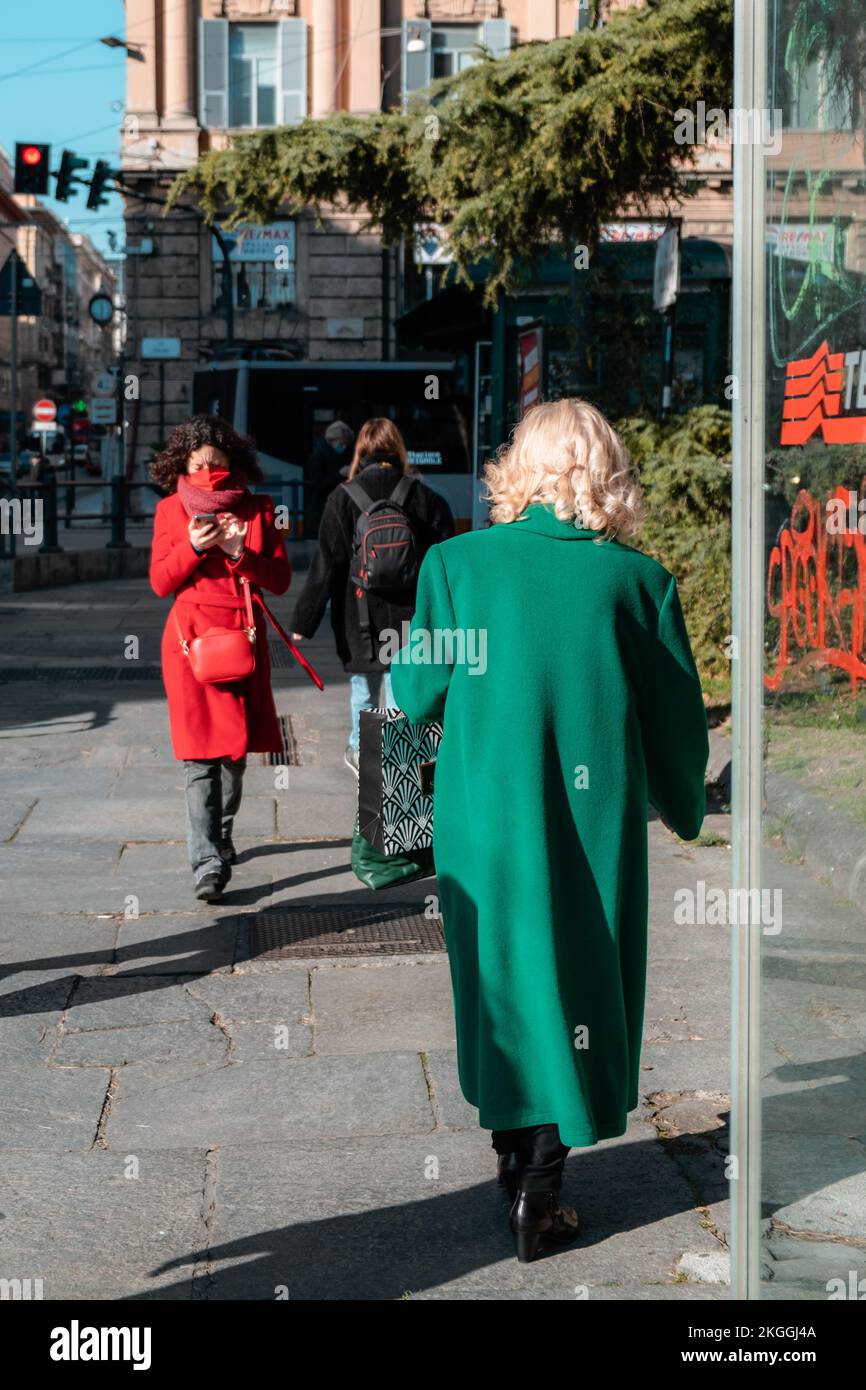 A vertical shot of the people walking around in Genoa, Italy Stock Photo
