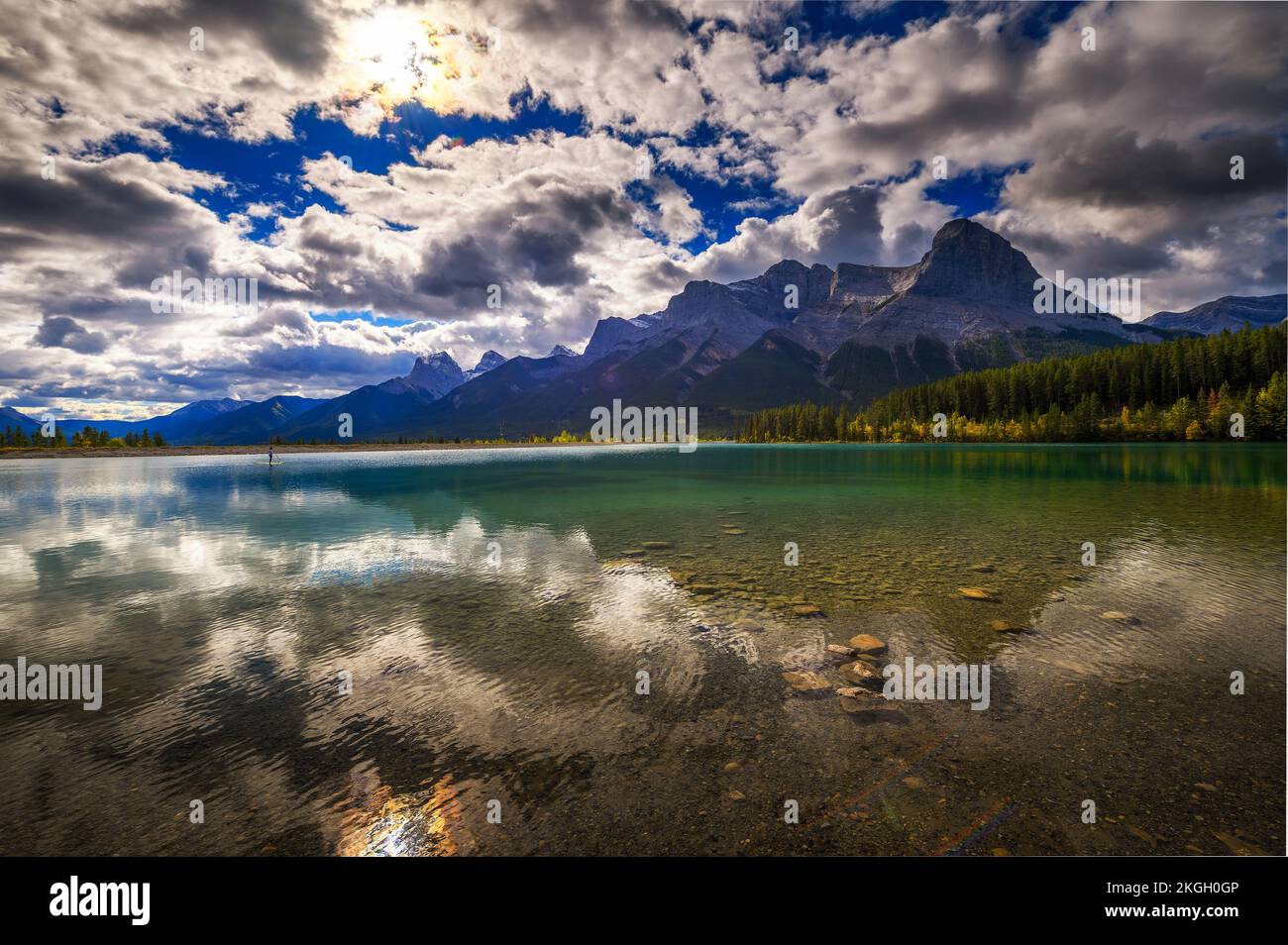 Rundle Forebay Reservoir with Rocky Mountains in Canmore, Canada Stock Photo
