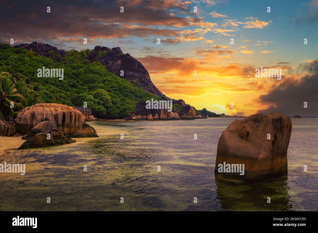 Colorful sunset over Anse Source D'argent beach at La Digue Island, Seychelles Stock Photo