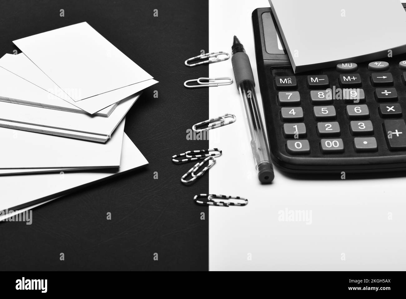 Office tools on black and white background as business concept Stock