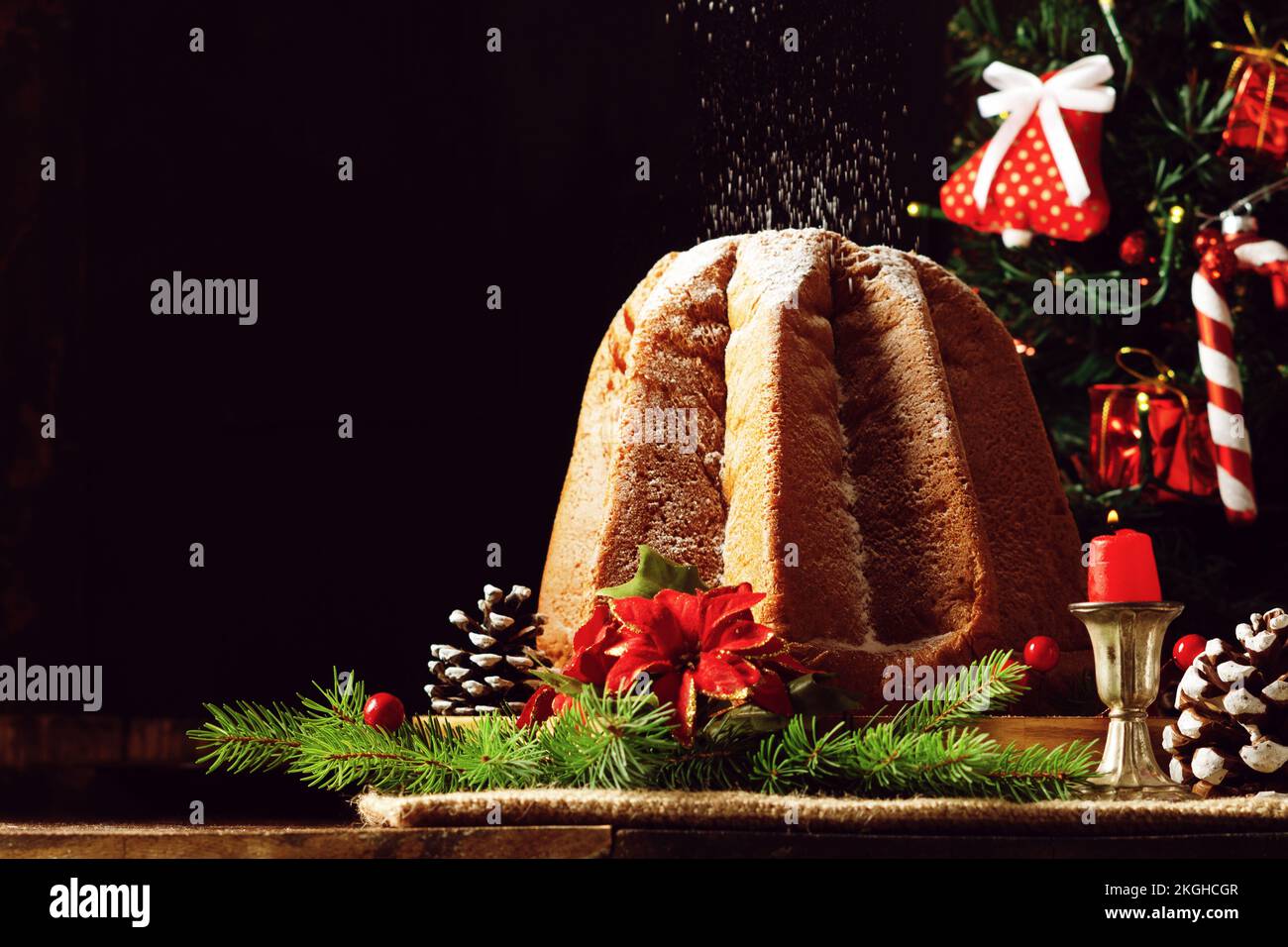 https://c8.alamy.com/comp/2KGHCGR/traditional-italian-christmas-sweet-bread-pandoro-with-vanilla-scented-icing-sugar-and-christmas-decorations-on-wooden-background-copy-space-2KGHCGR.jpg