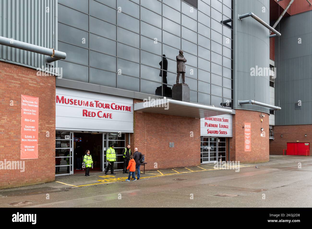 Sir Alex Ferguson statue by Philip Jackson and entrance to museum at
