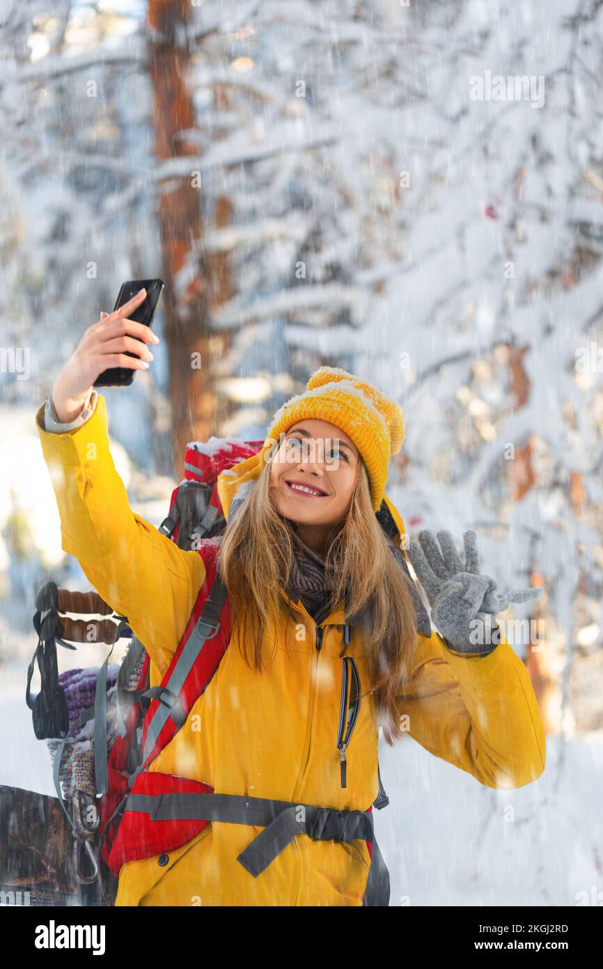 Vertical video hiking outdoors woman hi-res stock photography and