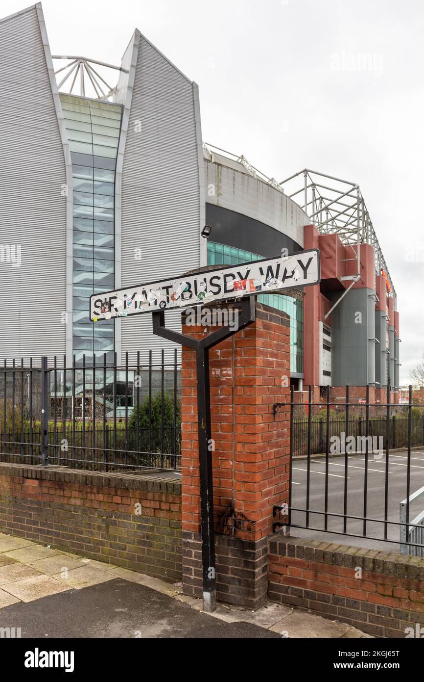 Sir Matt Busby Way & Manchester United's Old Trafford stadium, Manchester Stock Photo