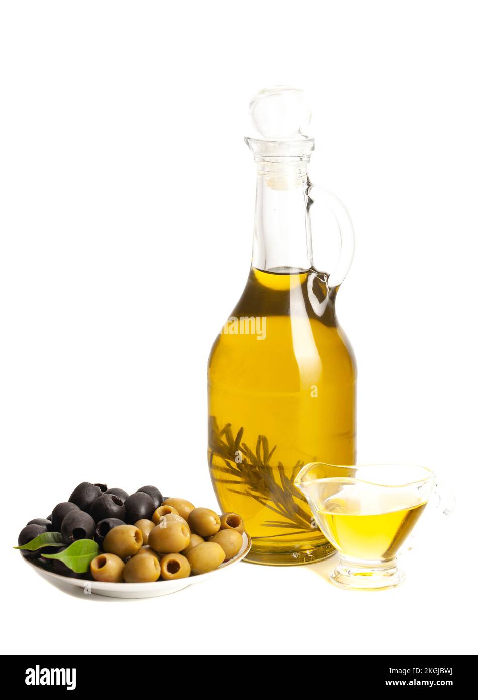 Jug with olive oil, green and black olives isolated on white background. Stock Photo