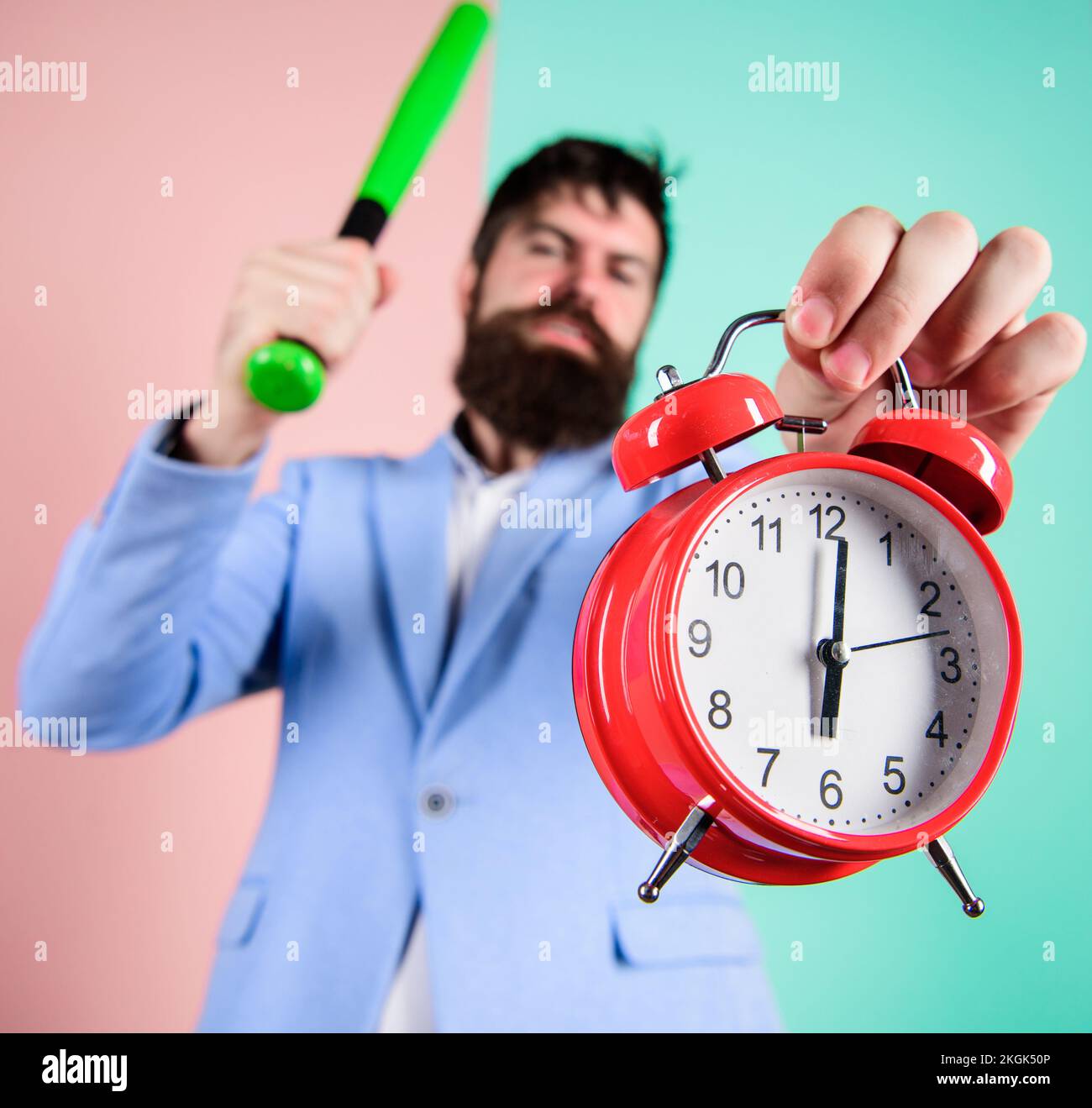 Discipline and sanctions. Boss aggressive face hold alarm clock