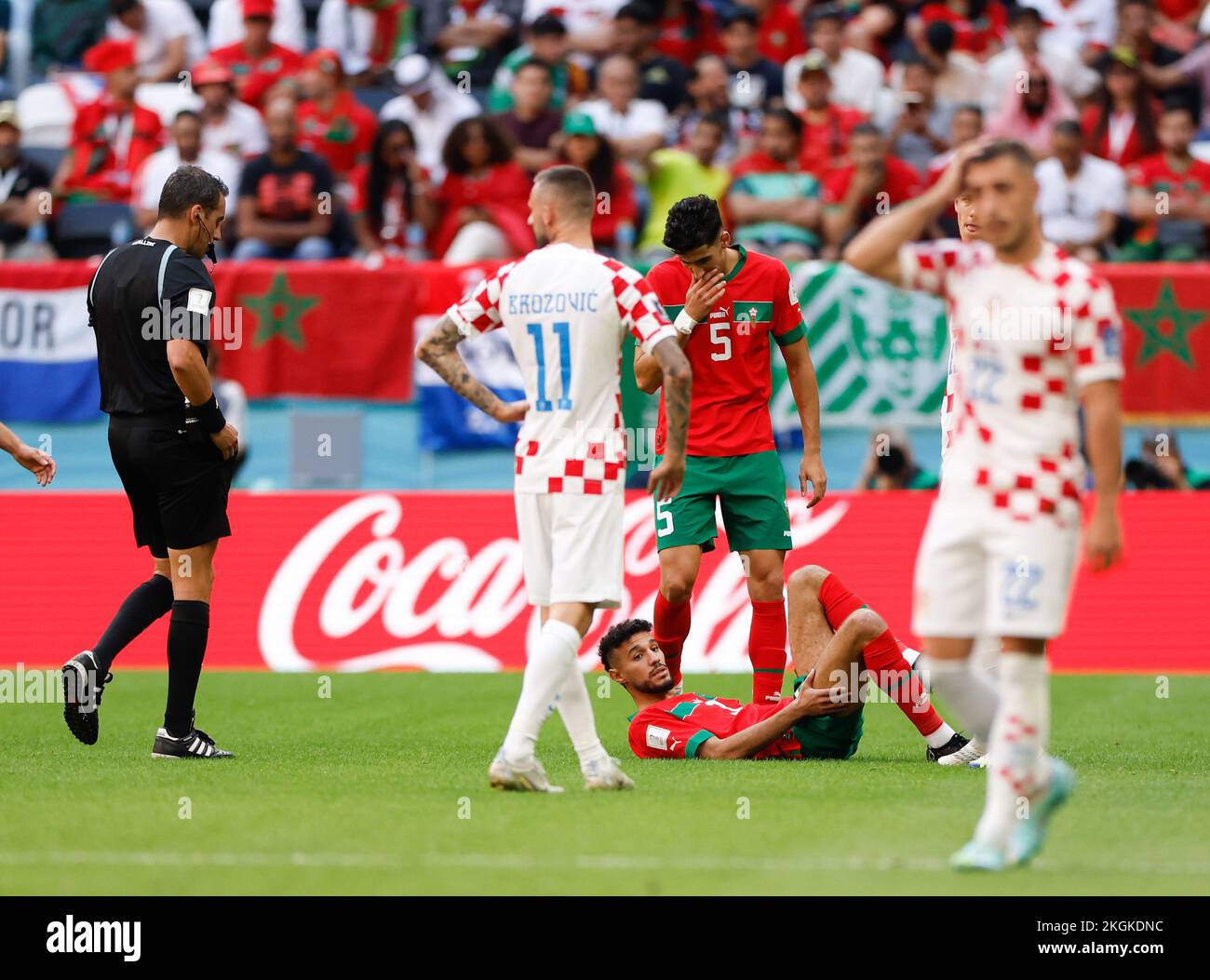 Al Khor, Qatar. 23rd Nov, 2022. Noussair Mazraoui (bottom) of Morocco ...