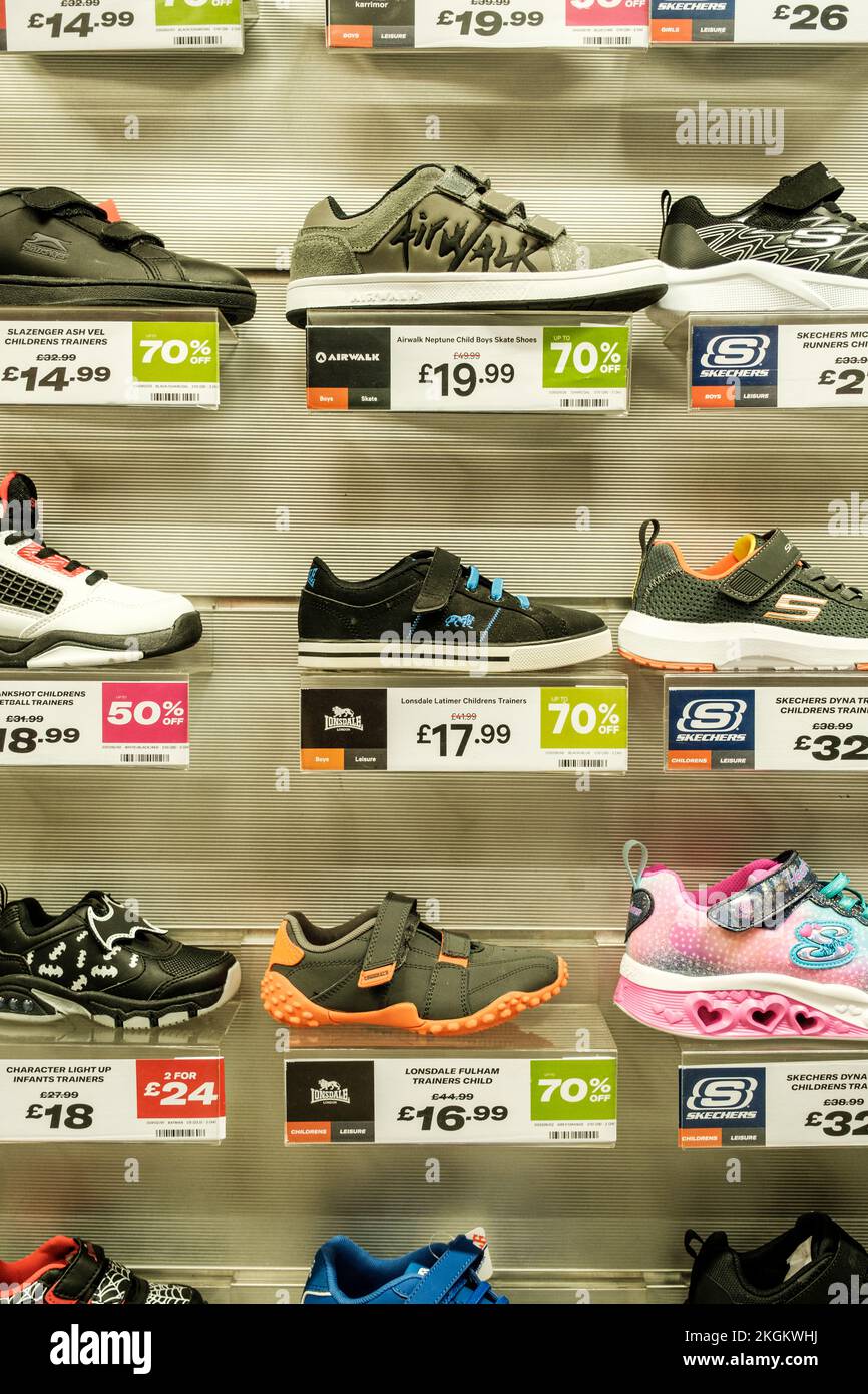 Epsom, Surrey, London UK, November 20 2022, Shop Display Of Trainers Or Sports Fashion Shoes With No People Stock Photo