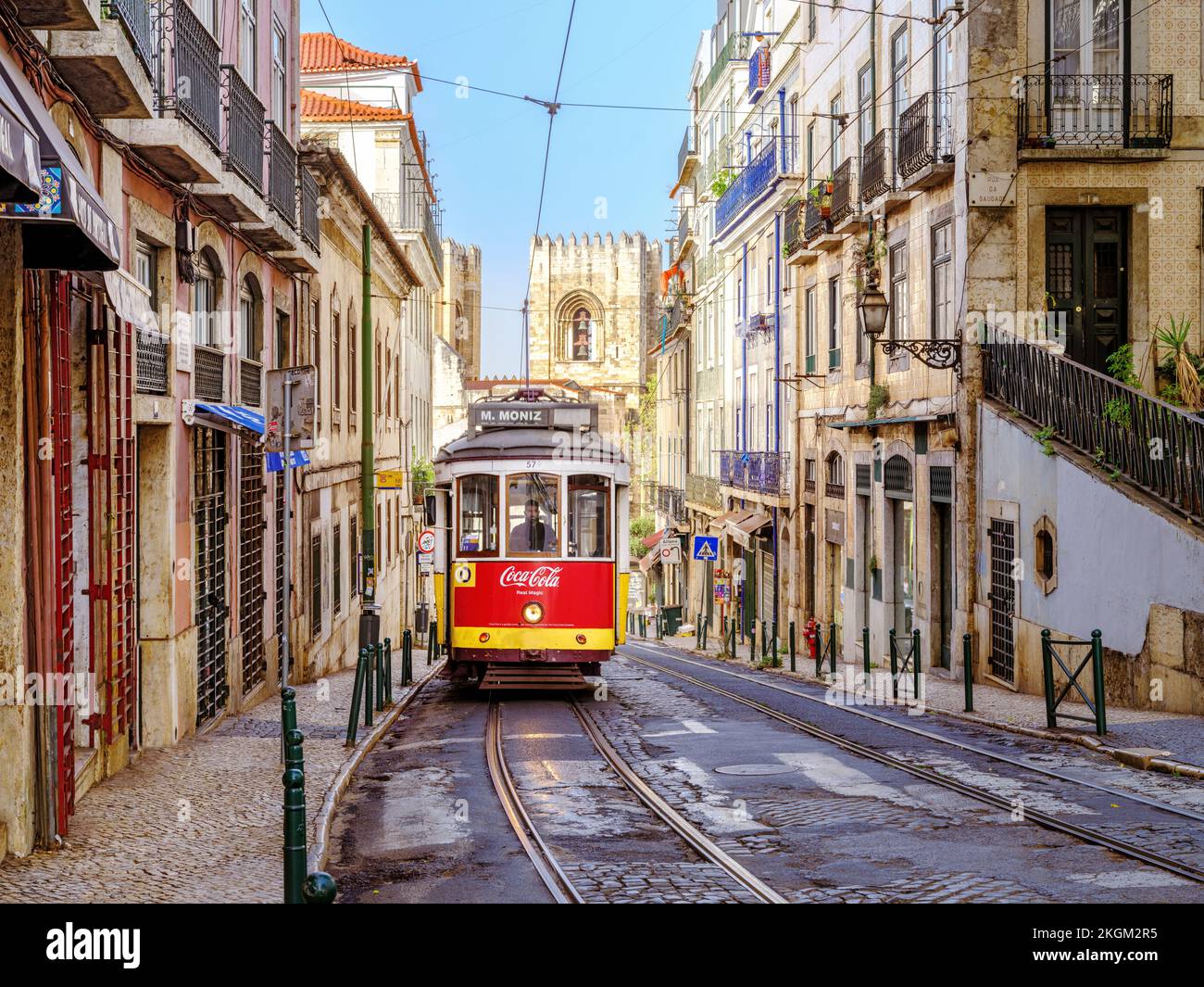 Hist—ric Alfama District , Street Scene with yellow Vintage Tram Number ...