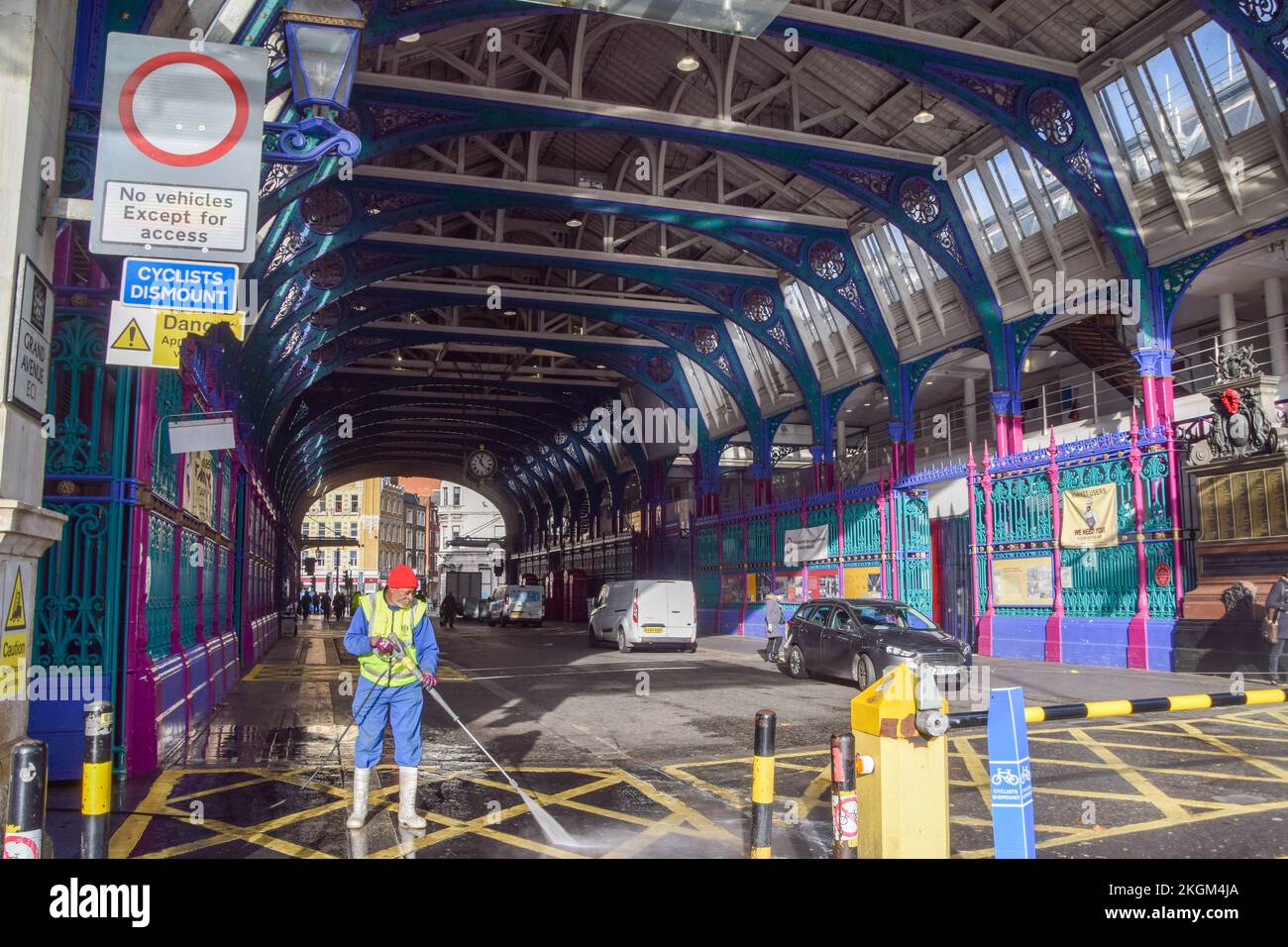 London, UK. 23rd November 2022. A worker cleans the entrance and delivery hall at Smithfield Market. The Museum of London will close in December 2022 as it prepares to move from its current site at London Wall to Smithfield Meat Market, which will relocate to Dagenham. The new London Museum is scheduled to open in 2026. Credit: Vuk Valcic/Alamy Live News Stock Photo