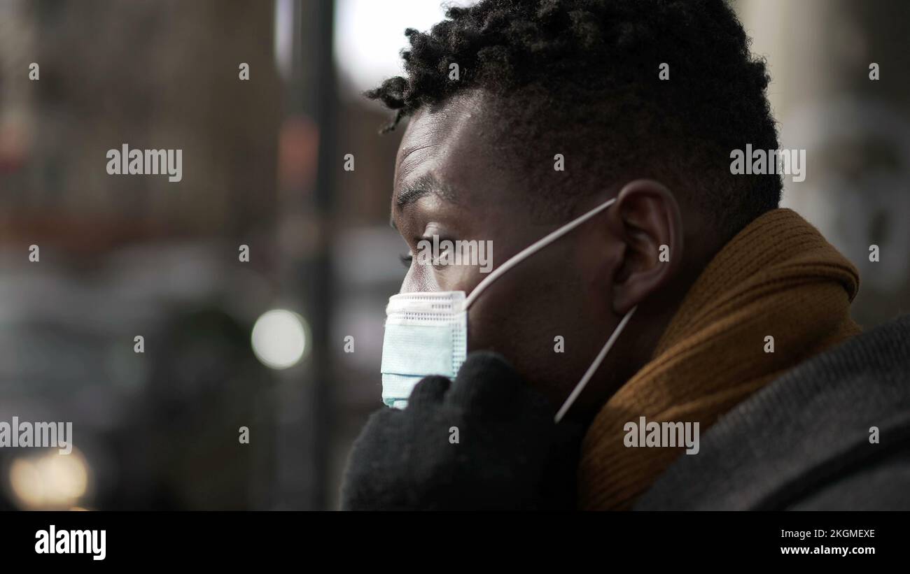 Black man putting covid face hi-res stock photography and images - Alamy