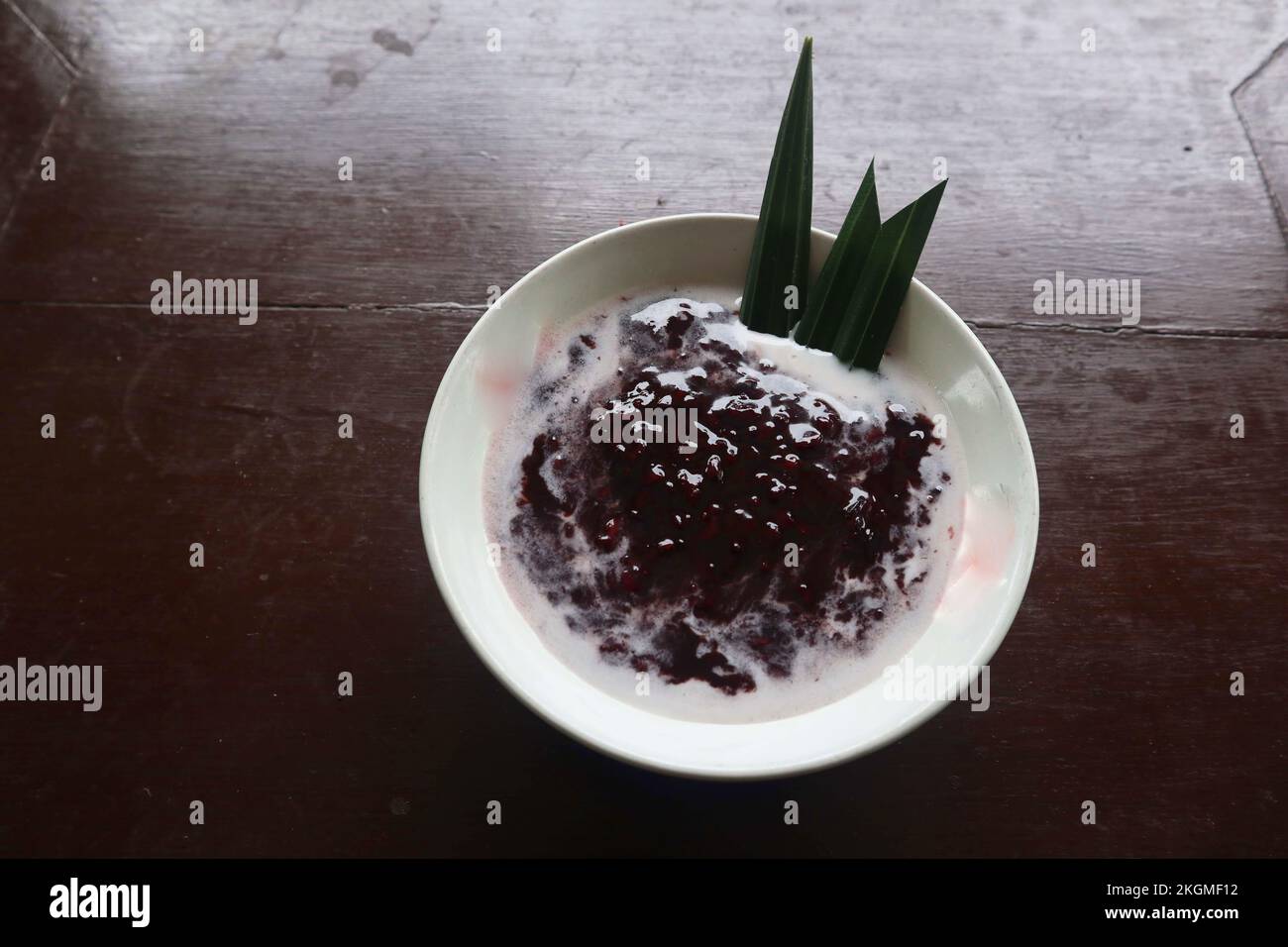 black sticky rice porridge in a bowl. bubur ketan hitam Stock Photo