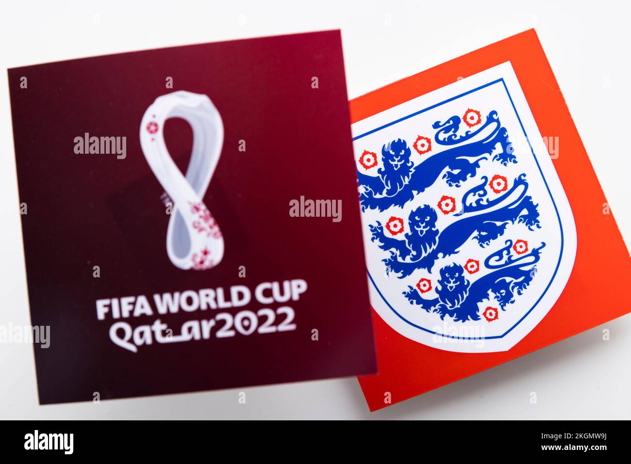 LONDON, UK - December 2022: England football logo Three lions national emblem with Qatar world cup logo Stock Photo