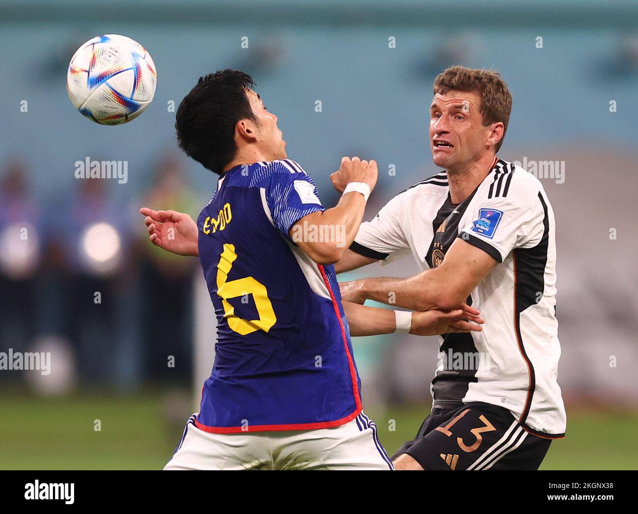 Doha, Qatar. 23rd Nov, 2022. Wataru Endo of Japan challenges Thomas Mueller of Germany during the FIFA World Cup 2022 match at Khalifa International Stadium, Doha. Picture credit should read: David Klein/Sportimage Credit: Sportimage/Alamy Live News Stock Photo
