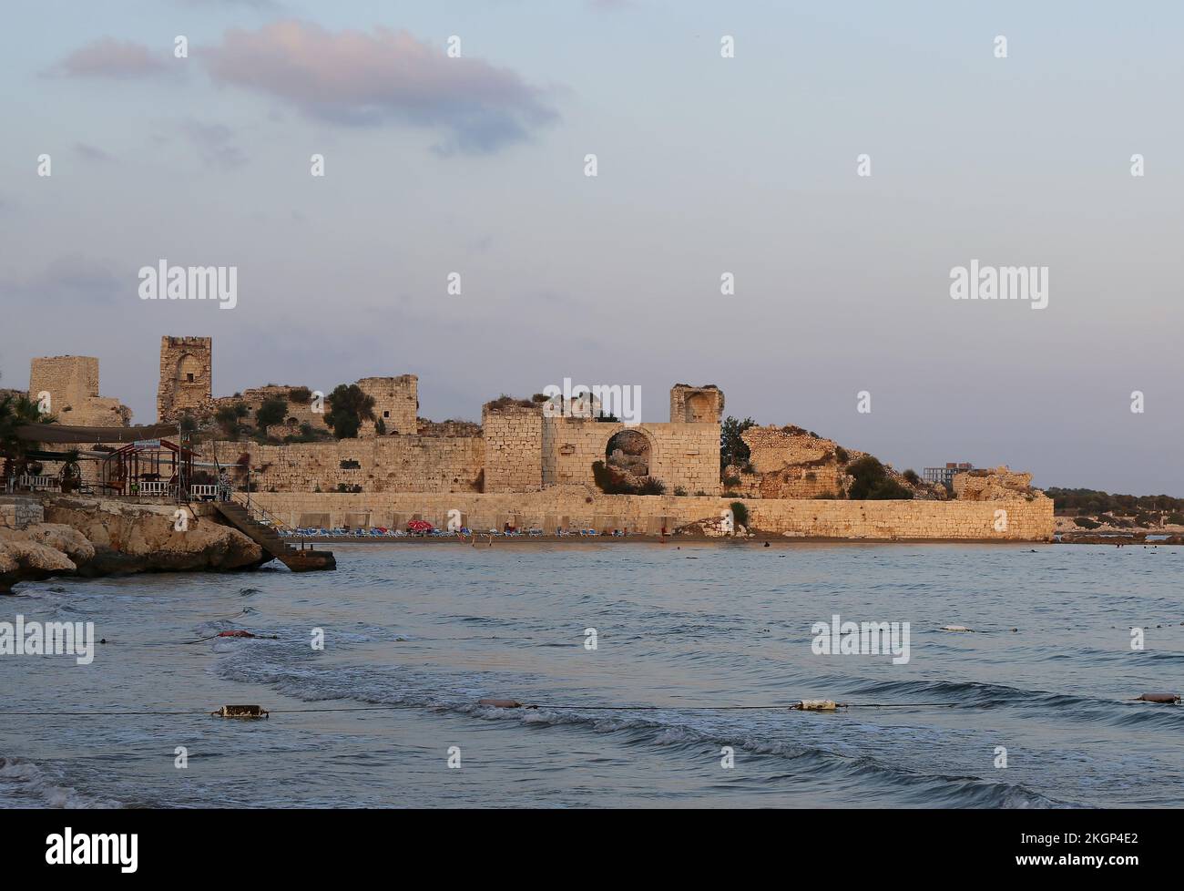 KIZKALESI,MERSIN,TURKEY-OCTOBER 04:Ruins of Korykos Castle by the Kizkalesi Beach with Sunset Colors.October 04,2022 in Kizkalesi, Mersin, Turkey Stock Photo
