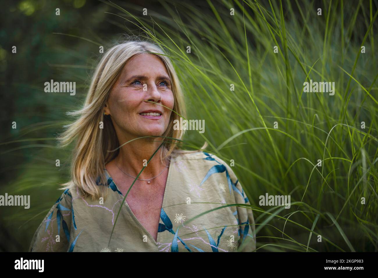 Beautiful mature woman blond hair hi-res stock photography and images ...