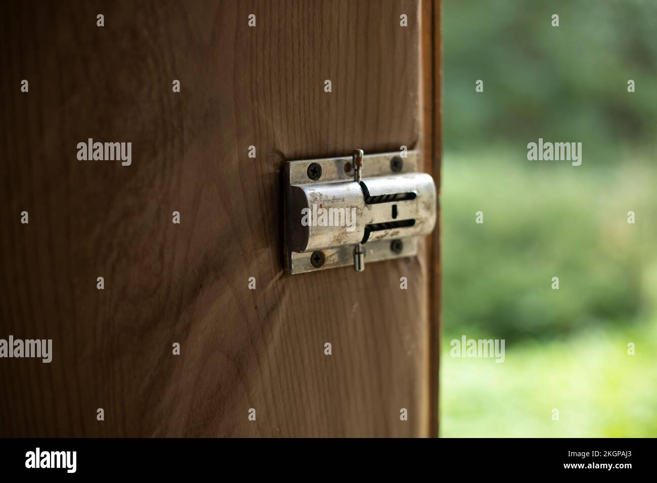 Lock on door. Heckled steel. Bolts on door. Details are included