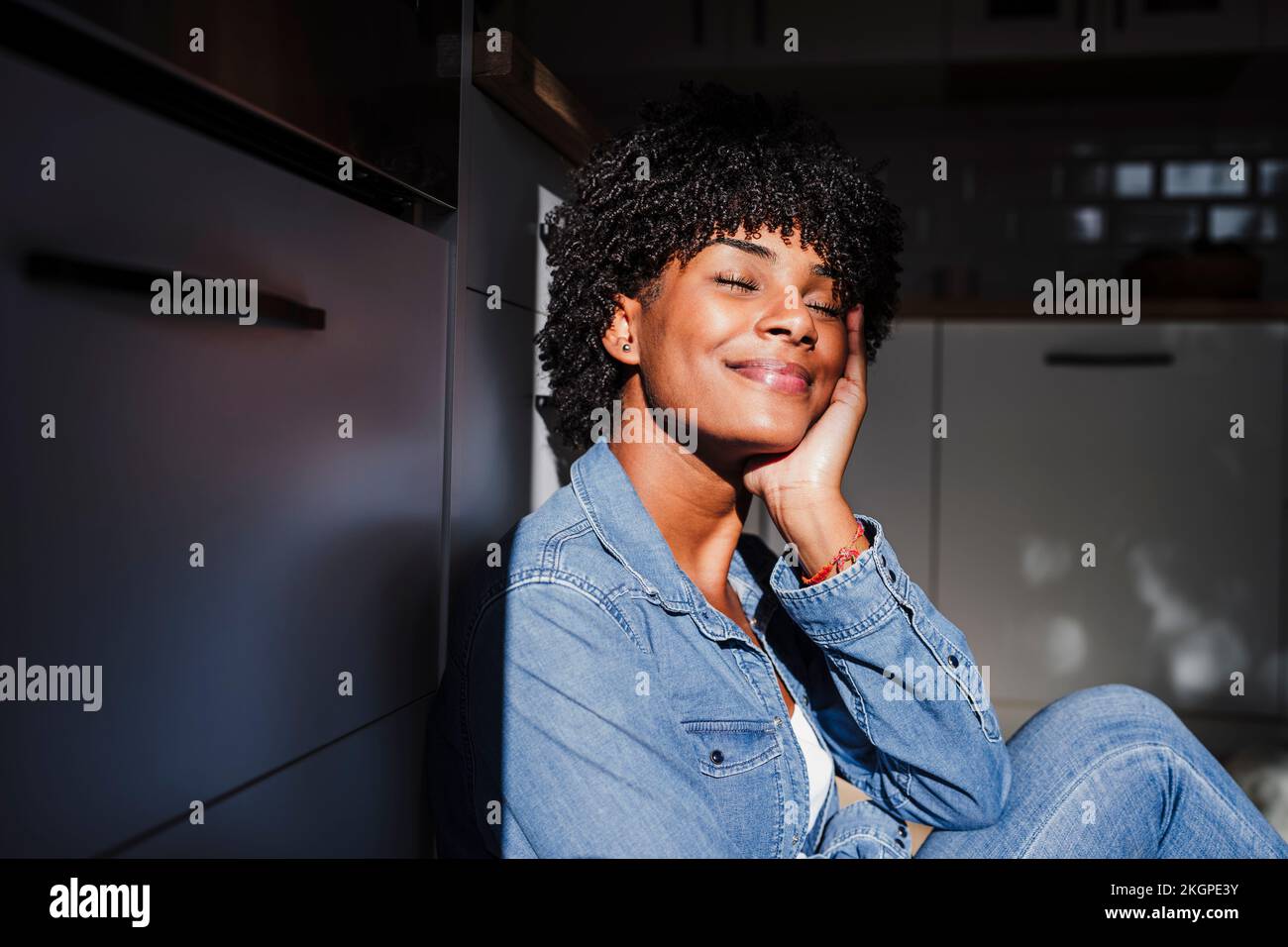 Hand young woman touching sunlight hi-res stock photography and images ...