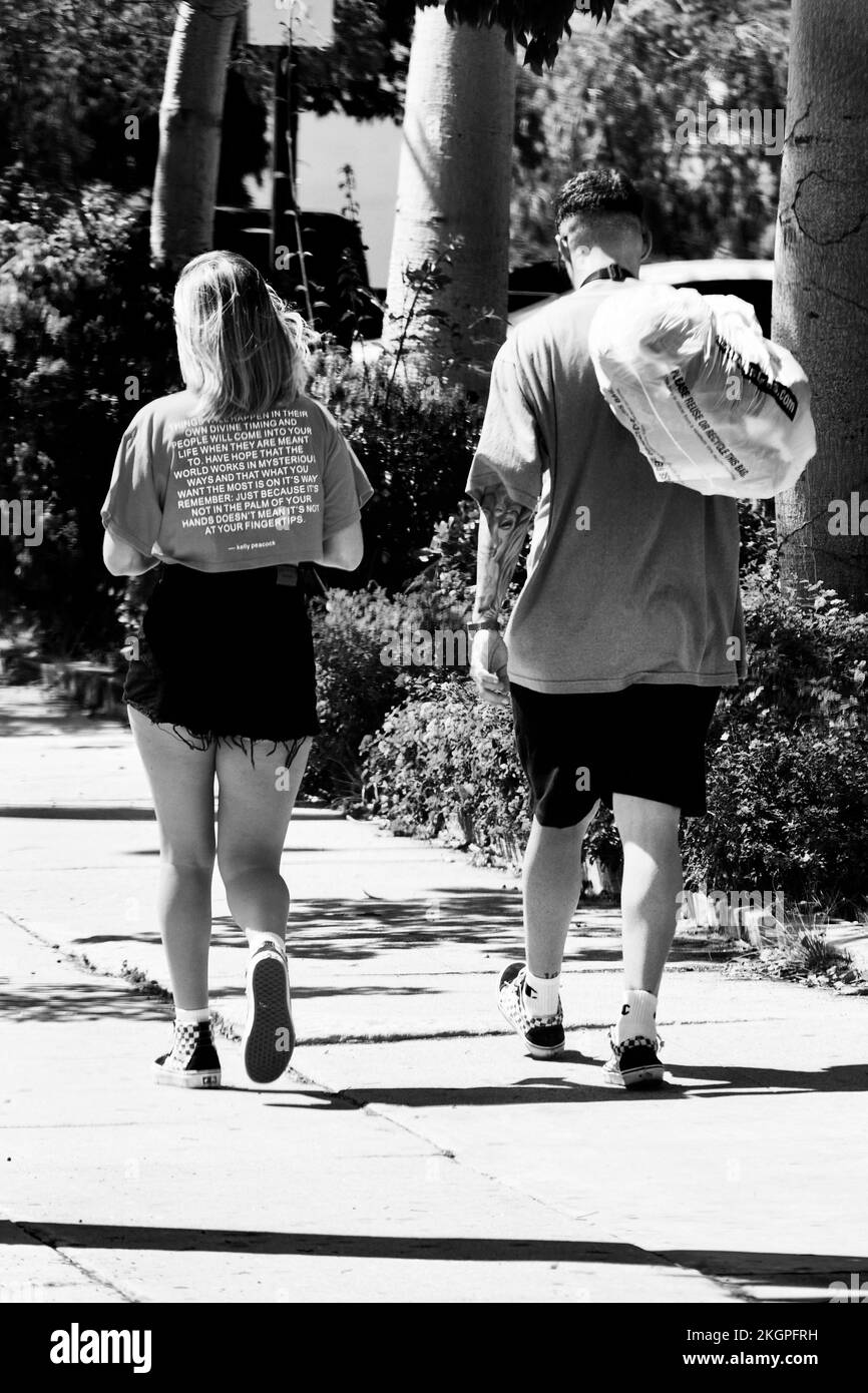 Woman and boy walking Black and White Stock Photos & Images - Alamy