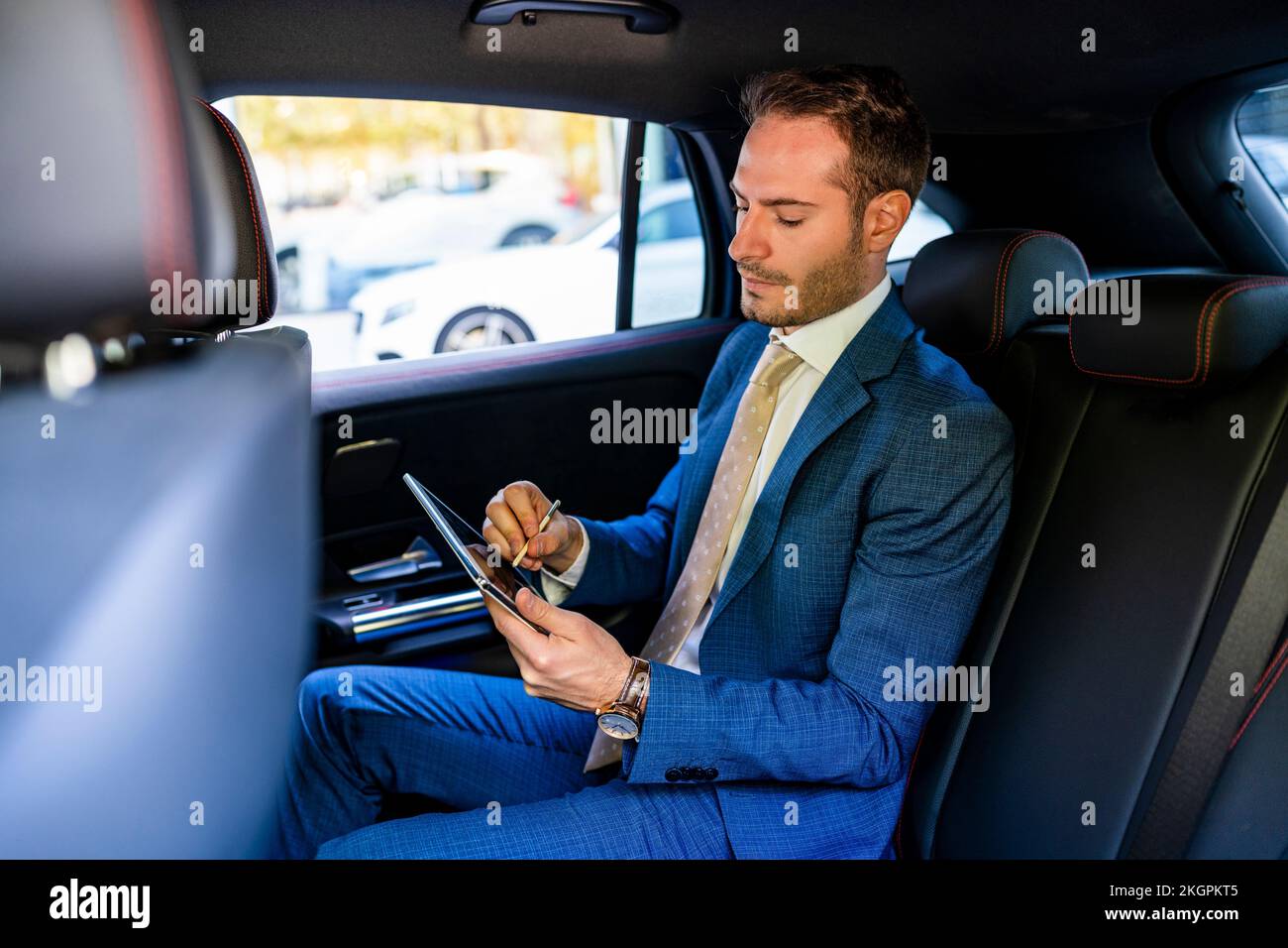 Sitting in blue seat business hi-res stock photography and images - Alamy